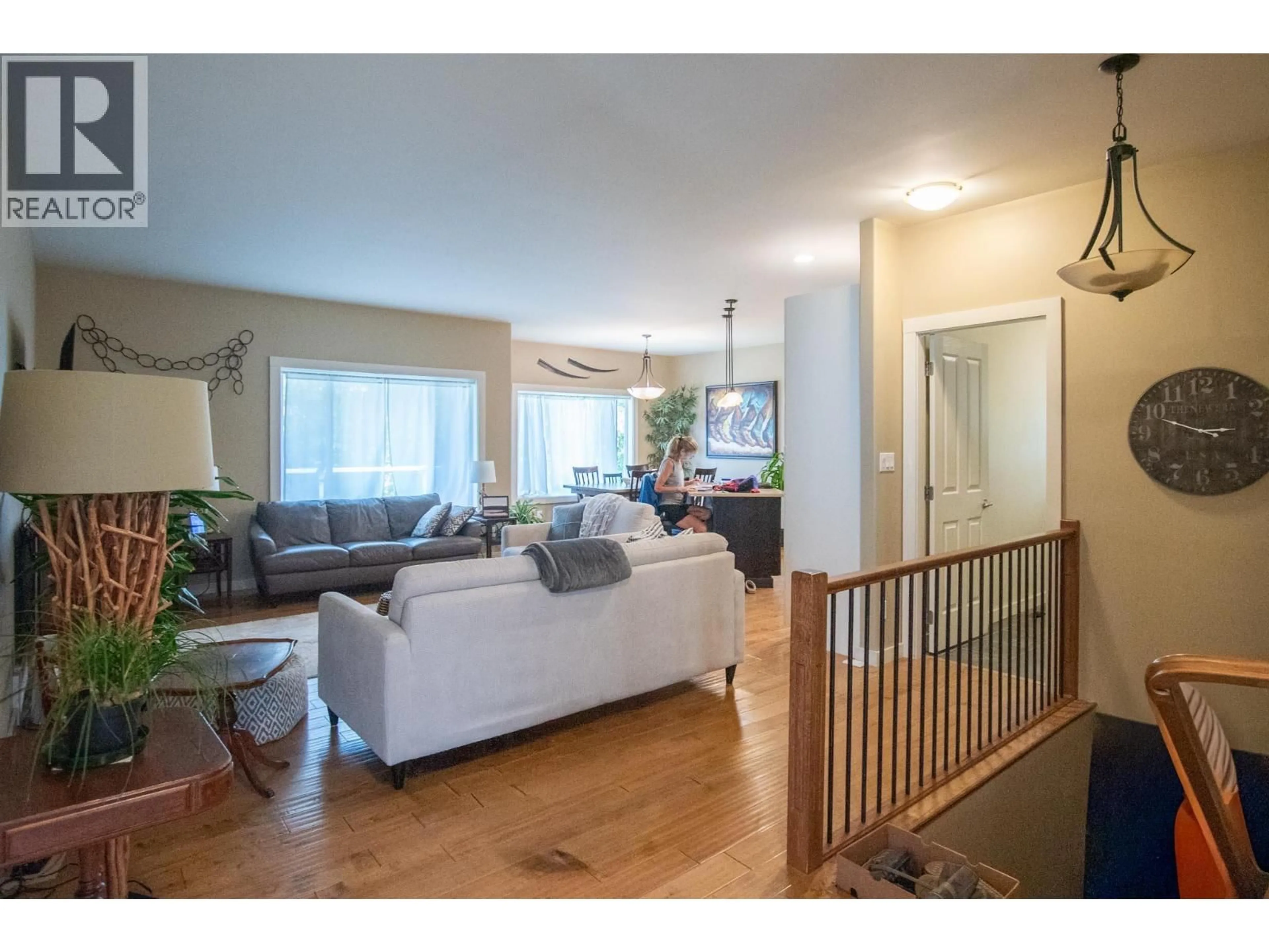 Living room with furniture, wood/laminate floor for 206 MURTLE ROAD, Clearwater British Columbia V0E1N1