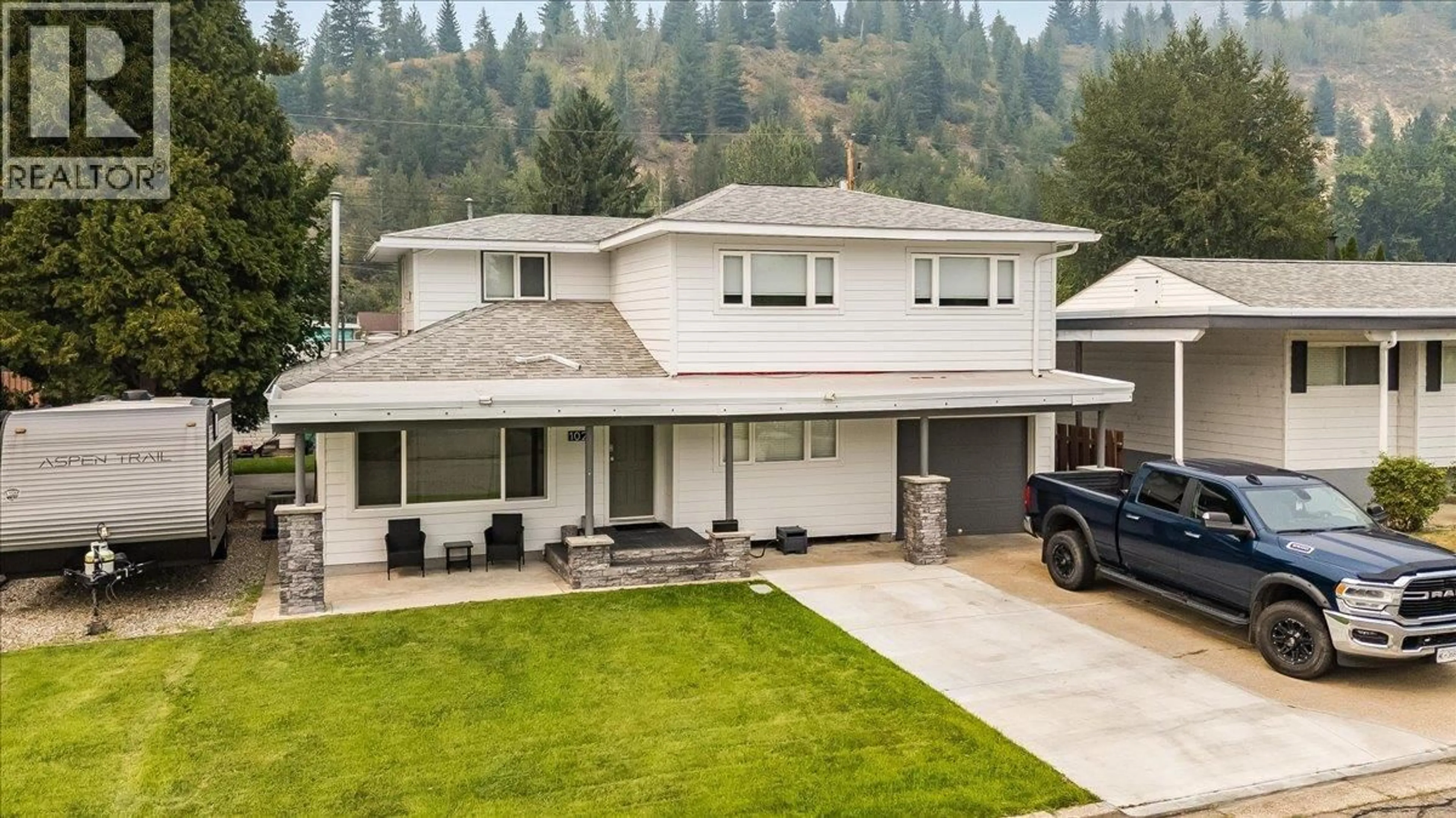 Home with vinyl exterior material, mountain view for 1021 REGAN CRESCENT, Trail British Columbia V1R1C2