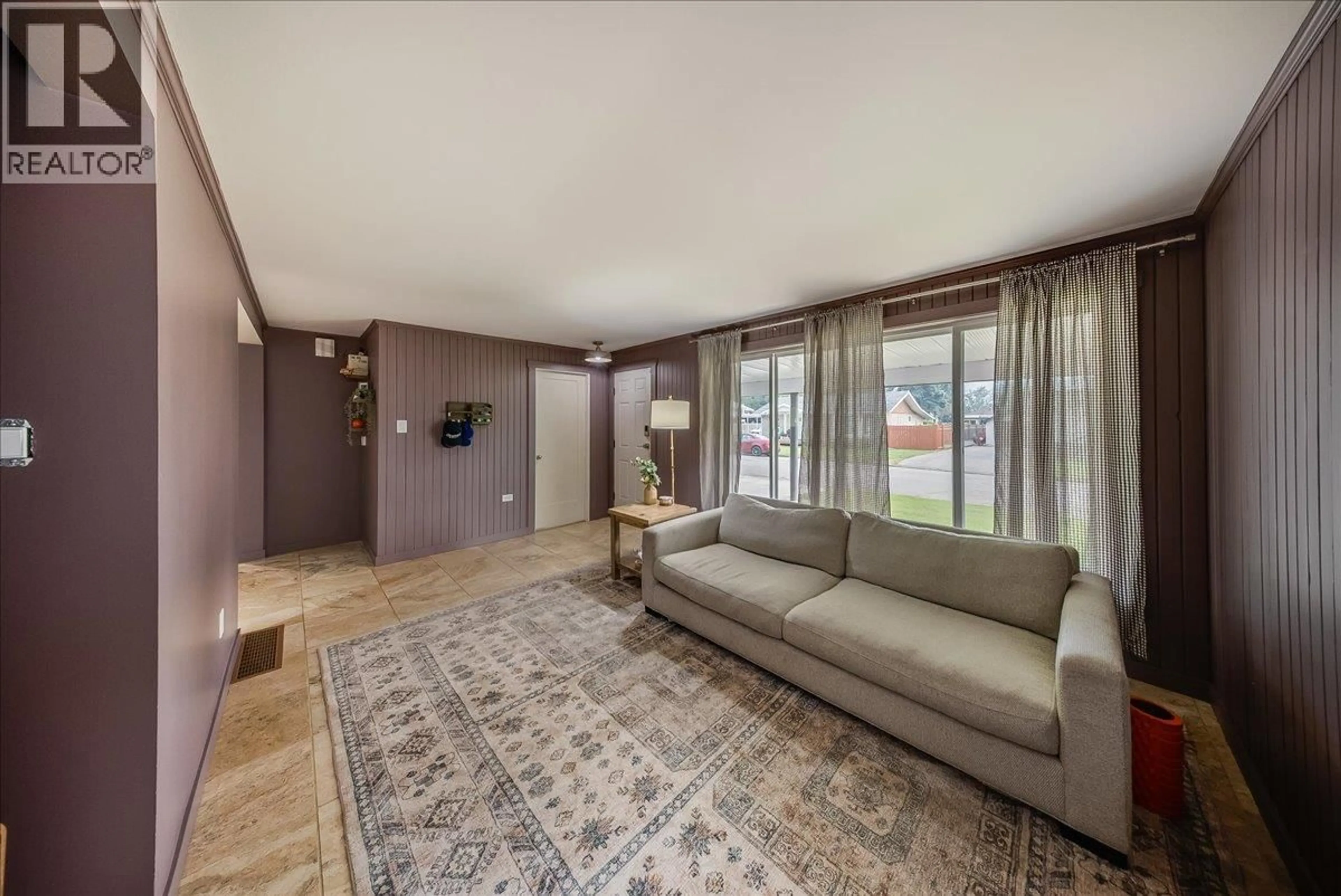 Living room with furniture, unknown for 1021 REGAN CRESCENT, Trail British Columbia V1R1C2