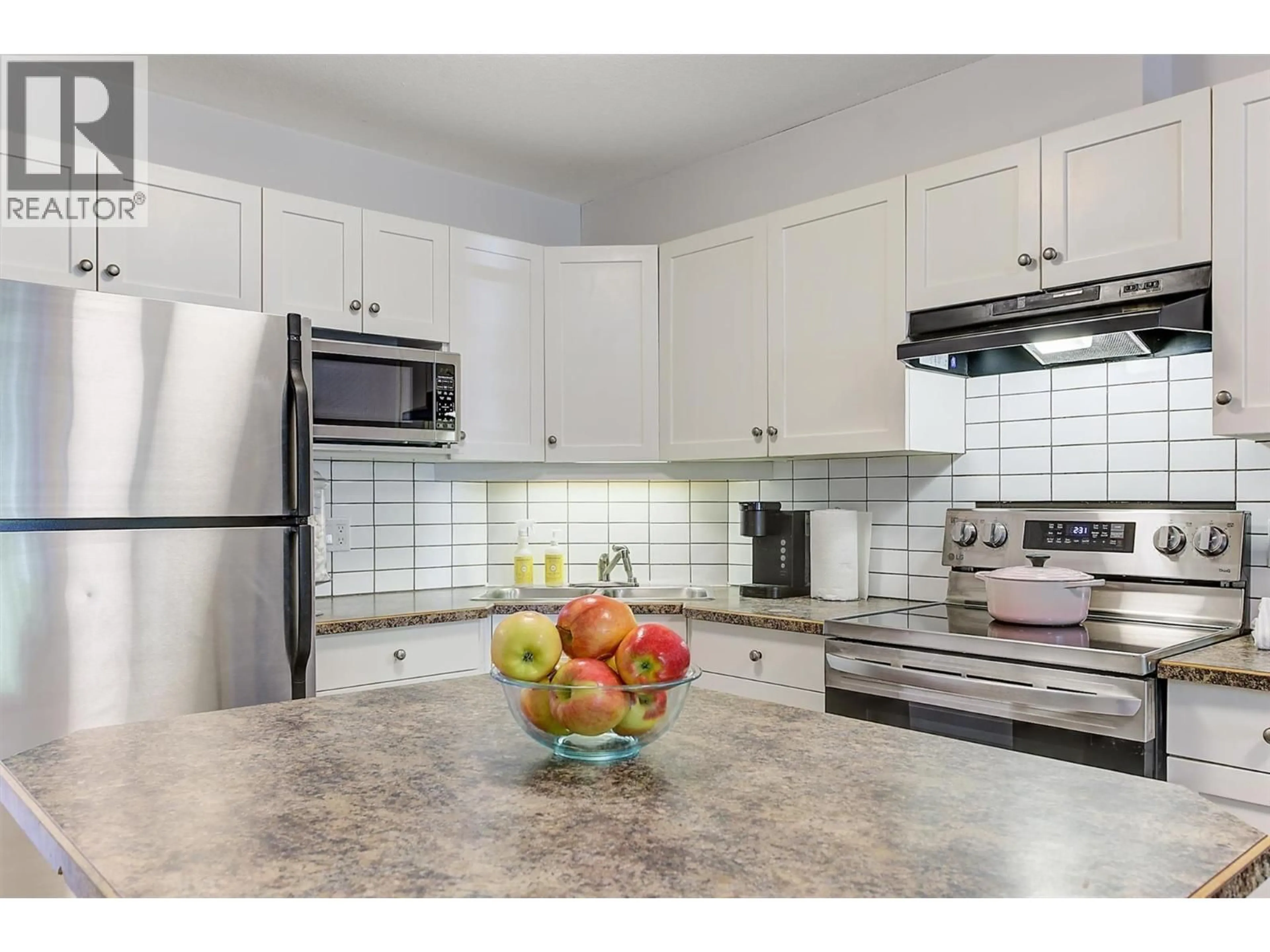 Open concept kitchen, ceramic/tile floor for 113 - 1390 DILWORTH CRESCENT, Kelowna British Columbia V1Y4M5