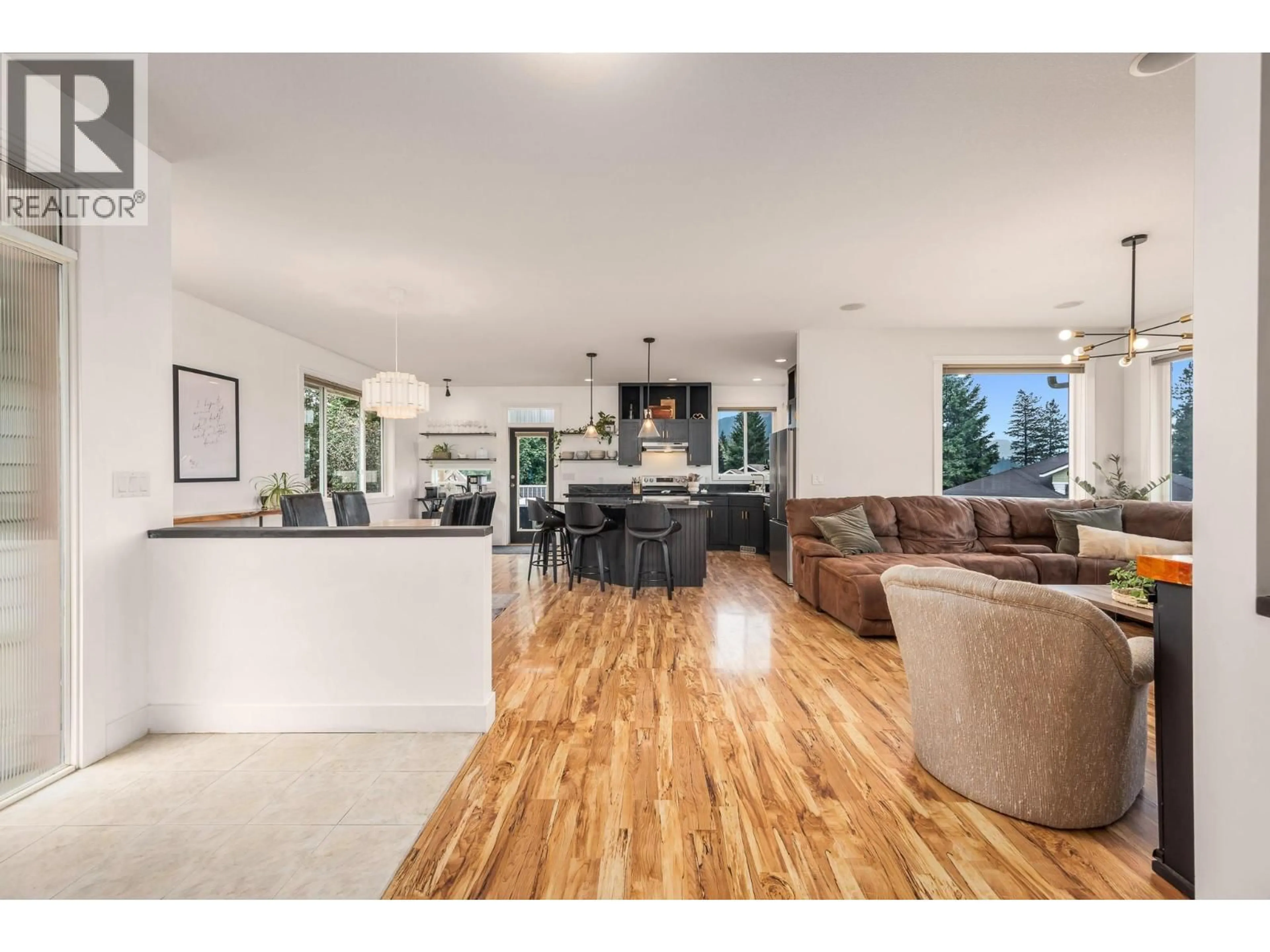 Open concept kitchen, wood/laminate floor for 2040 SKYVIEW CRESCENT, Lumby British Columbia V0E2G0