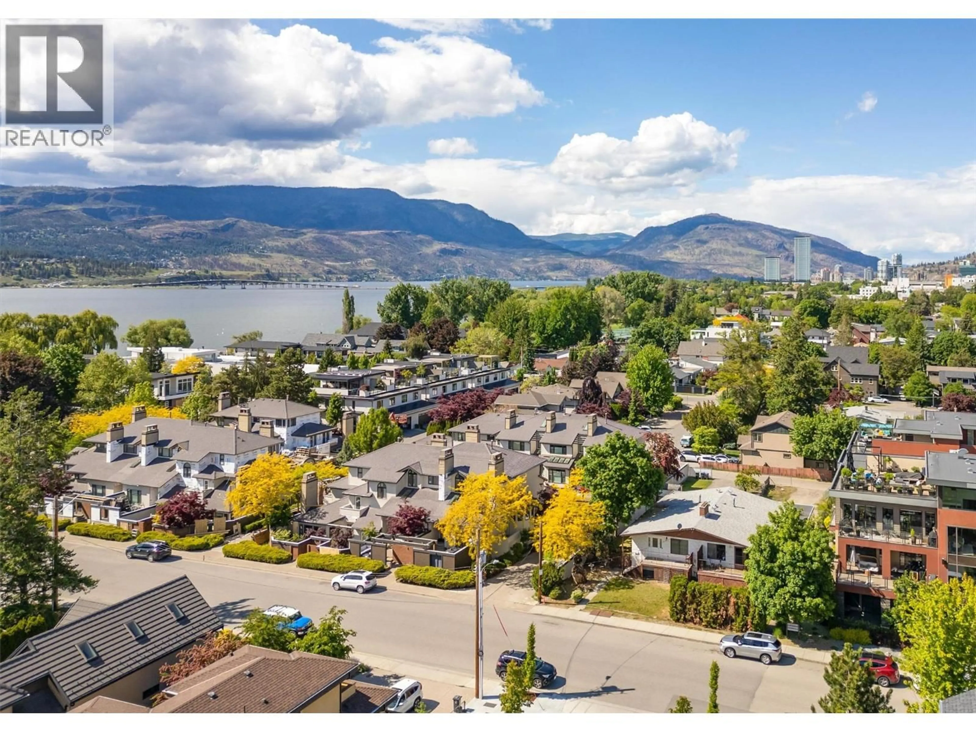 A pic from outside/outdoor area/front of a property/back of a property/a pic from drone, mountain view for 418 WEST AVENUE, Kelowna British Columbia V1Y4Z2