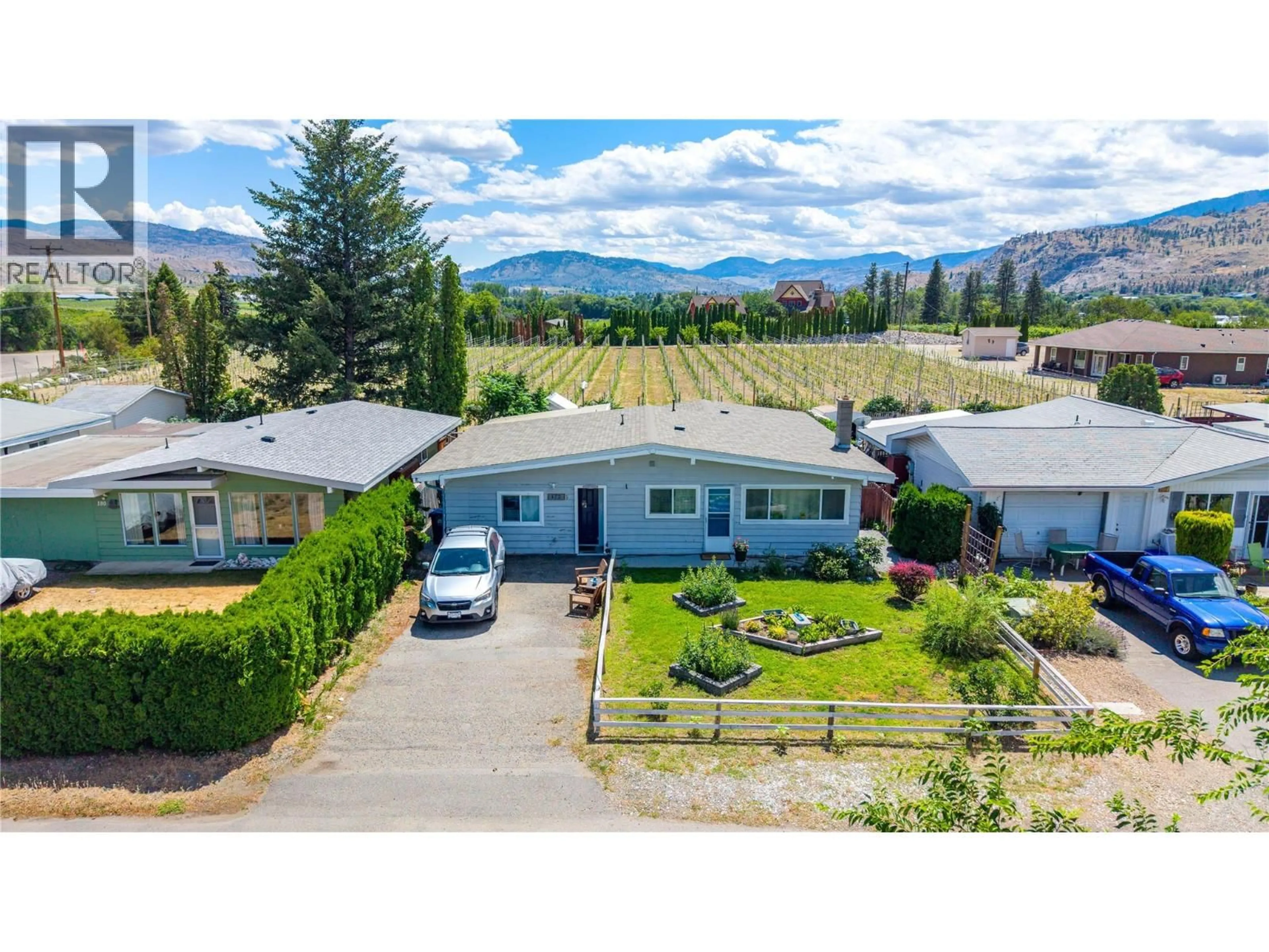 A pic from outside/outdoor area/front of a property/back of a property/a pic from drone, mountain view for 172 MCGOWAN ROAD, Oliver British Columbia V0H1T2