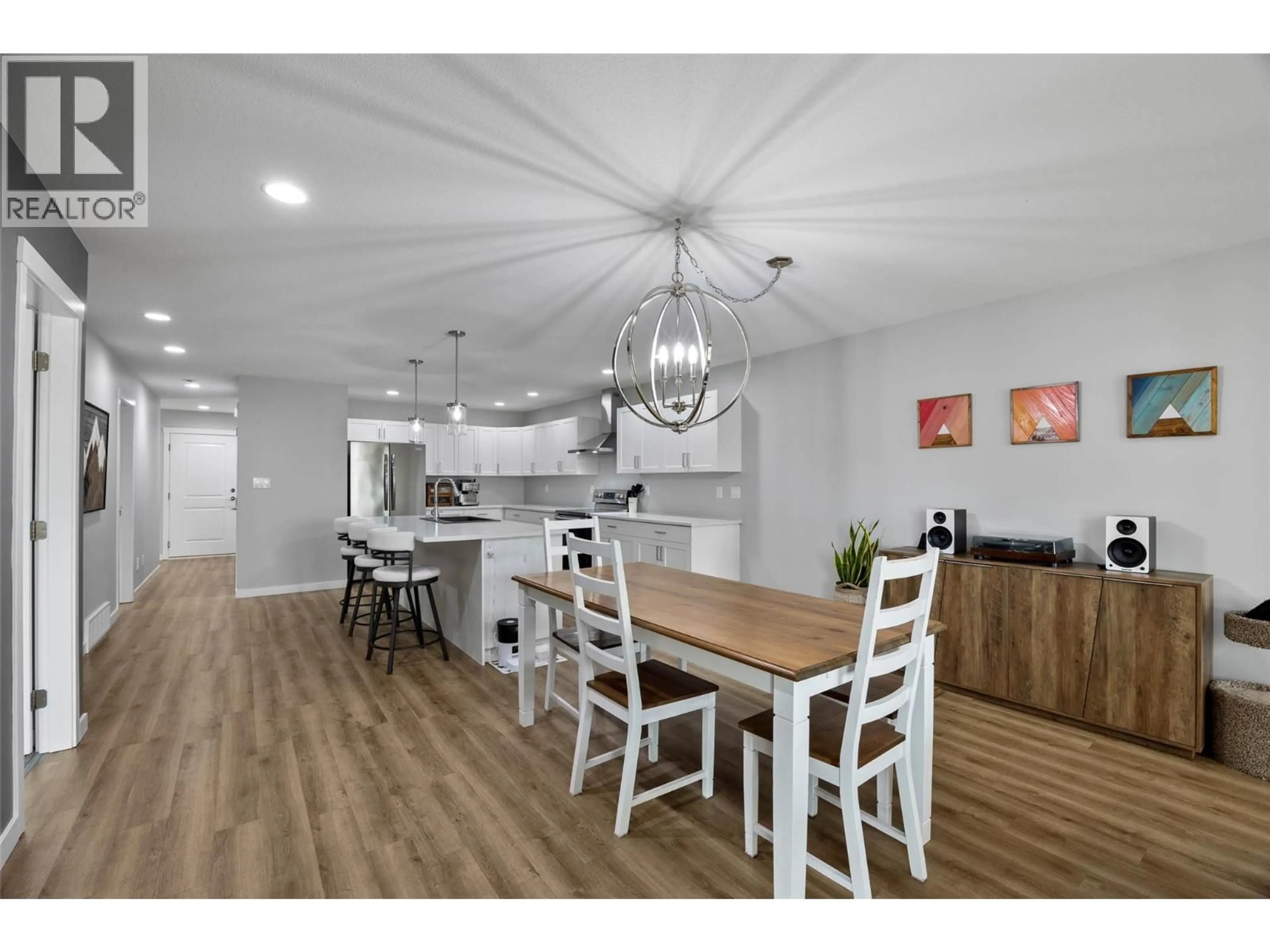 Open concept kitchen, wood/laminate floor for 668 LYNE ROAD, Kamloops British Columbia V2B6N7
