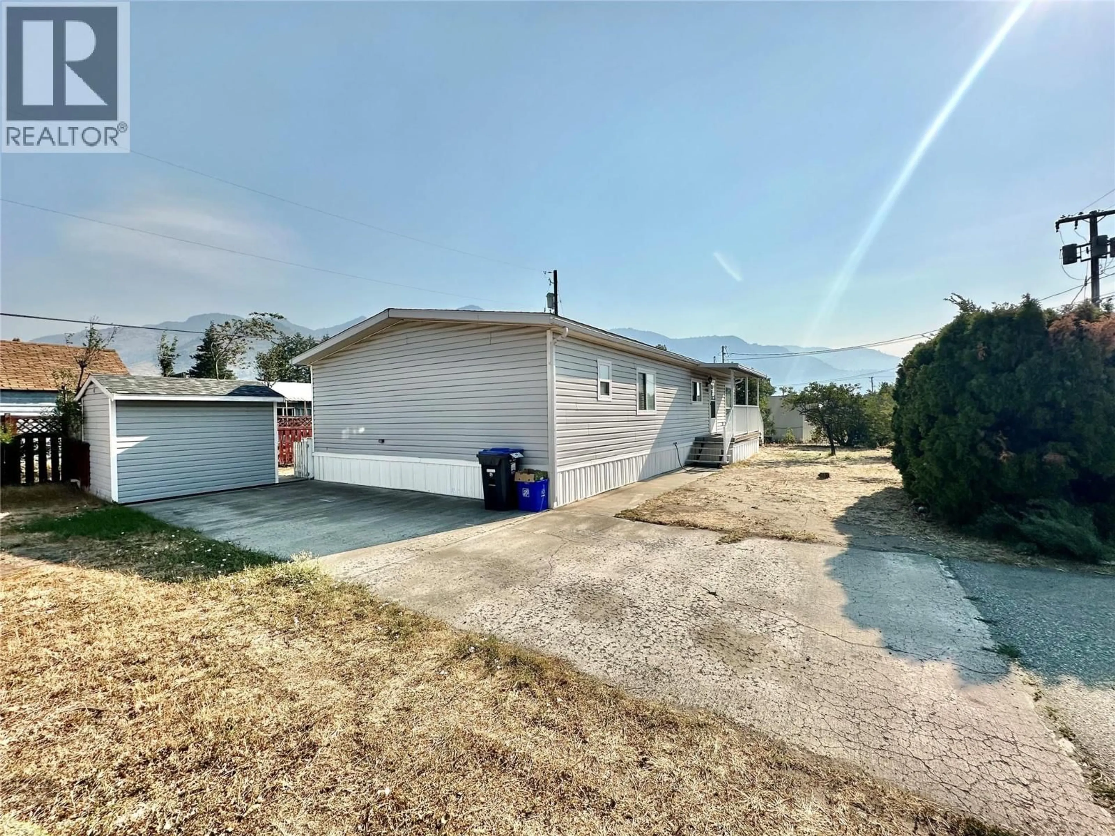 A pic from outside/outdoor area/front of a property/back of a property/a pic from drone, unknown for 908 BLAKEBOROUGH AVENUE, Keremeos British Columbia V0X1N2