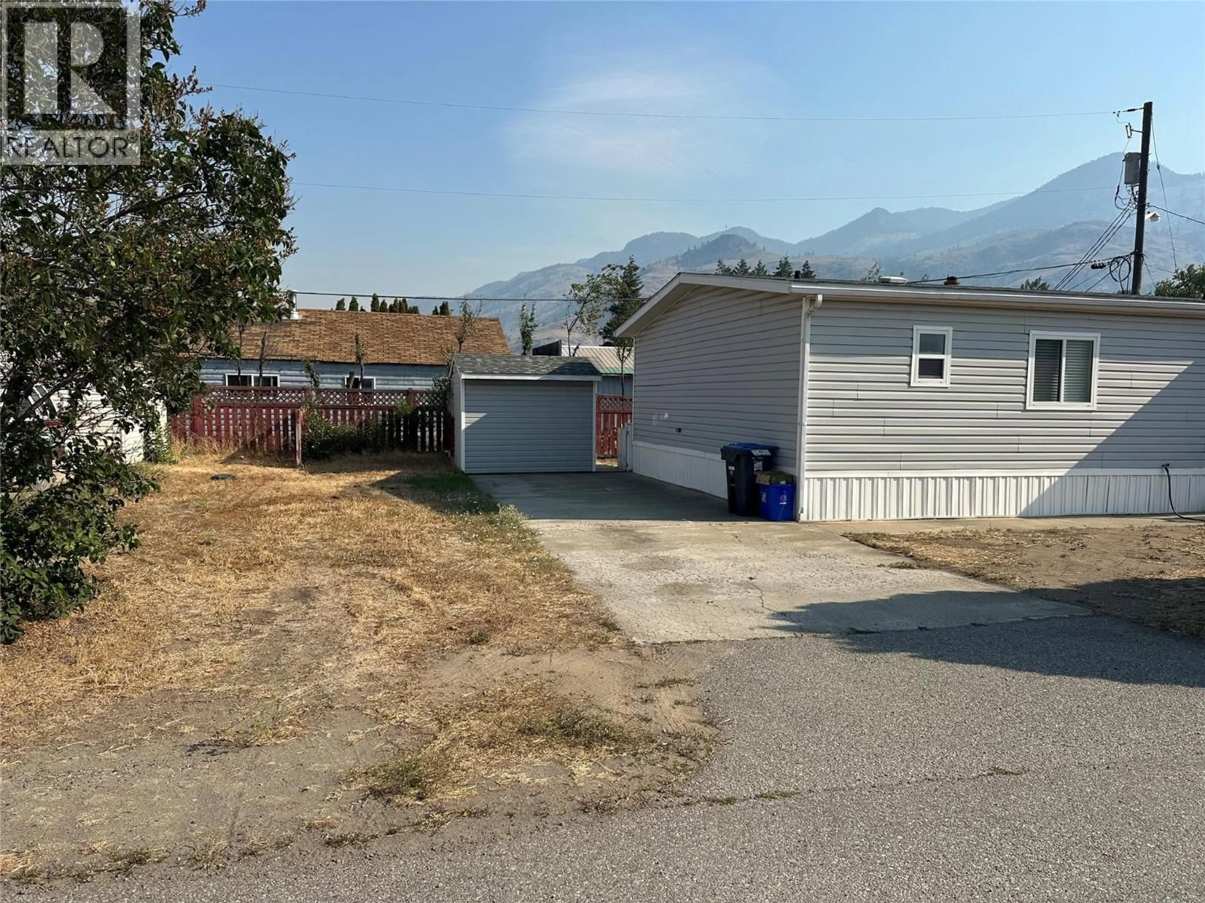 A pic from outside/outdoor area/front of a property/back of a property/a pic from drone, mountain view for 908 BLAKEBOROUGH AVENUE, Keremeos British Columbia V0X1N2
