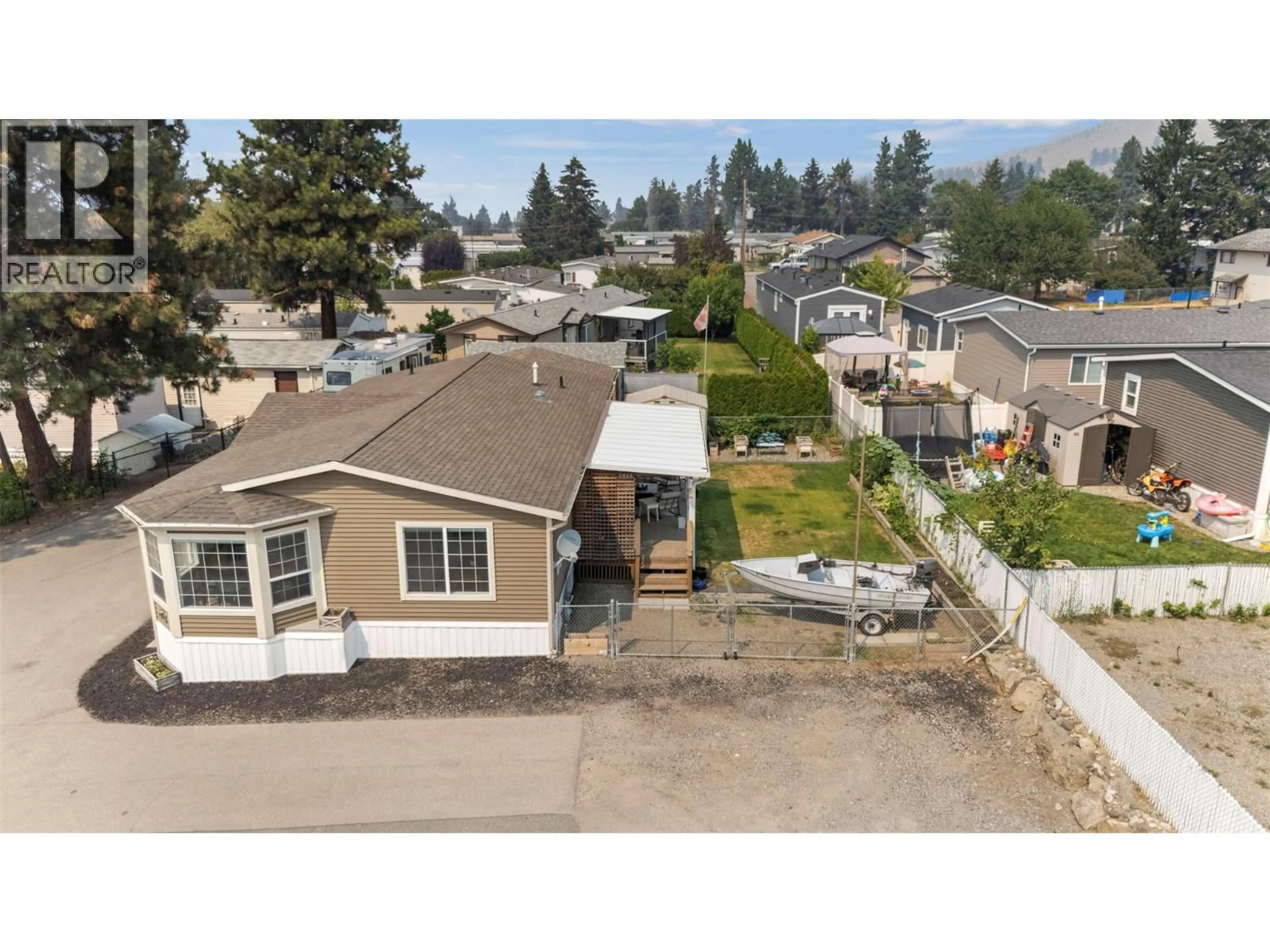A pic from outside/outdoor area/front of a property/back of a property/a pic from drone, street for 151 - 9020 JIM BAILEY ROAD, Kelowna British Columbia V4V1E5