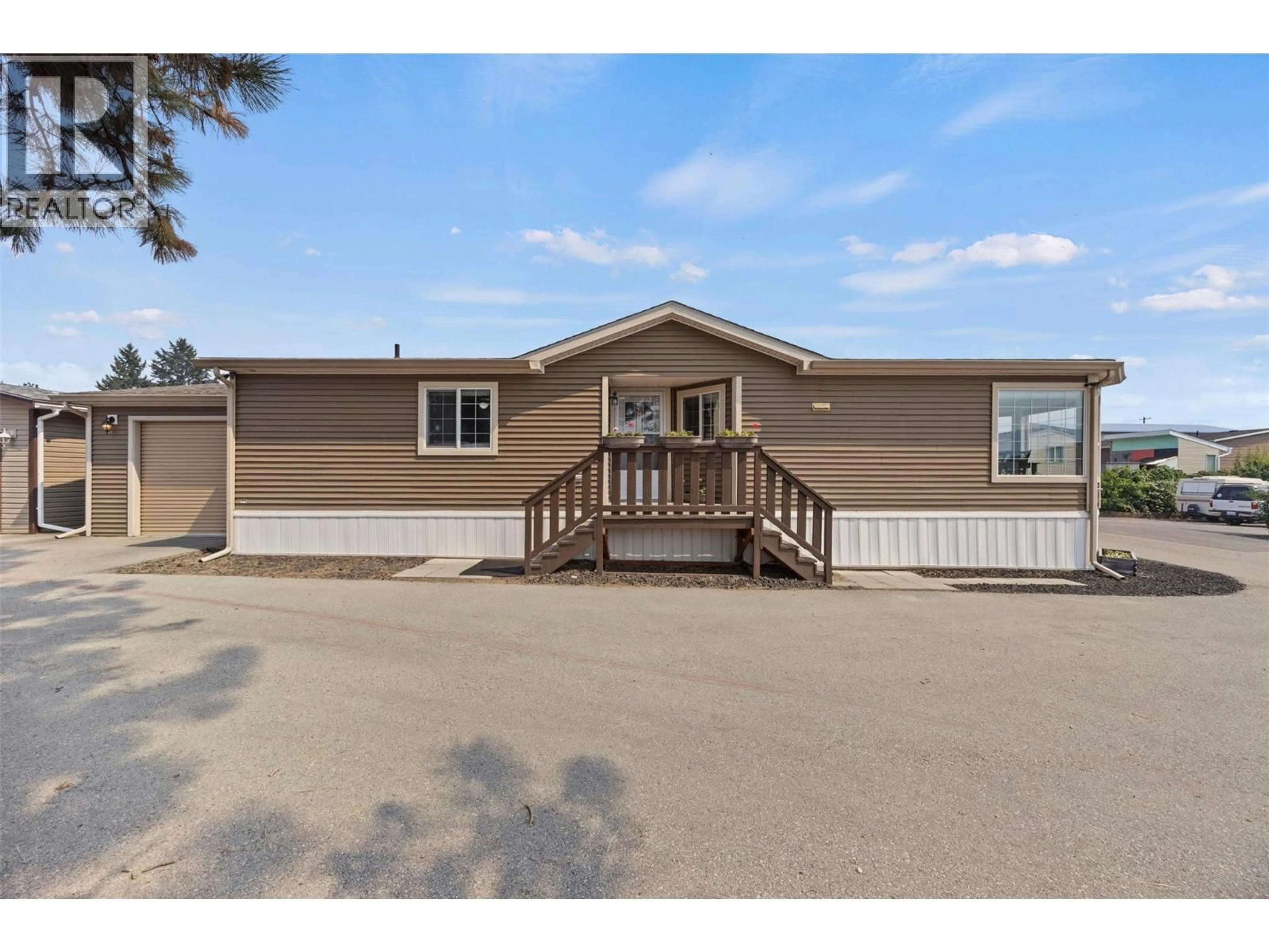 Home with vinyl exterior material, street for 151 - 9020 JIM BAILEY ROAD, Kelowna British Columbia V4V1E5