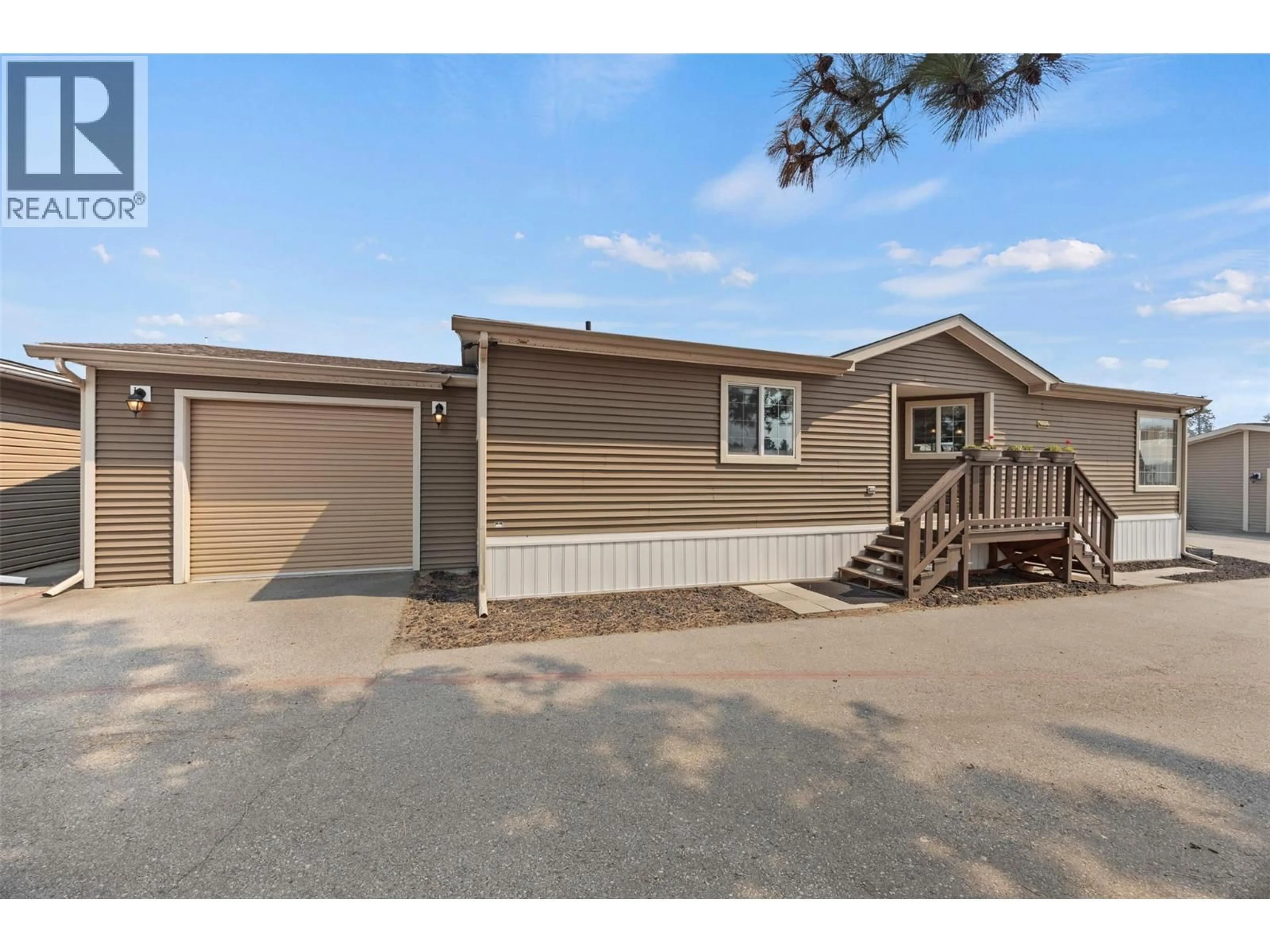 Home with vinyl exterior material, street for 151 - 9020 JIM BAILEY ROAD, Kelowna British Columbia V4V1E5