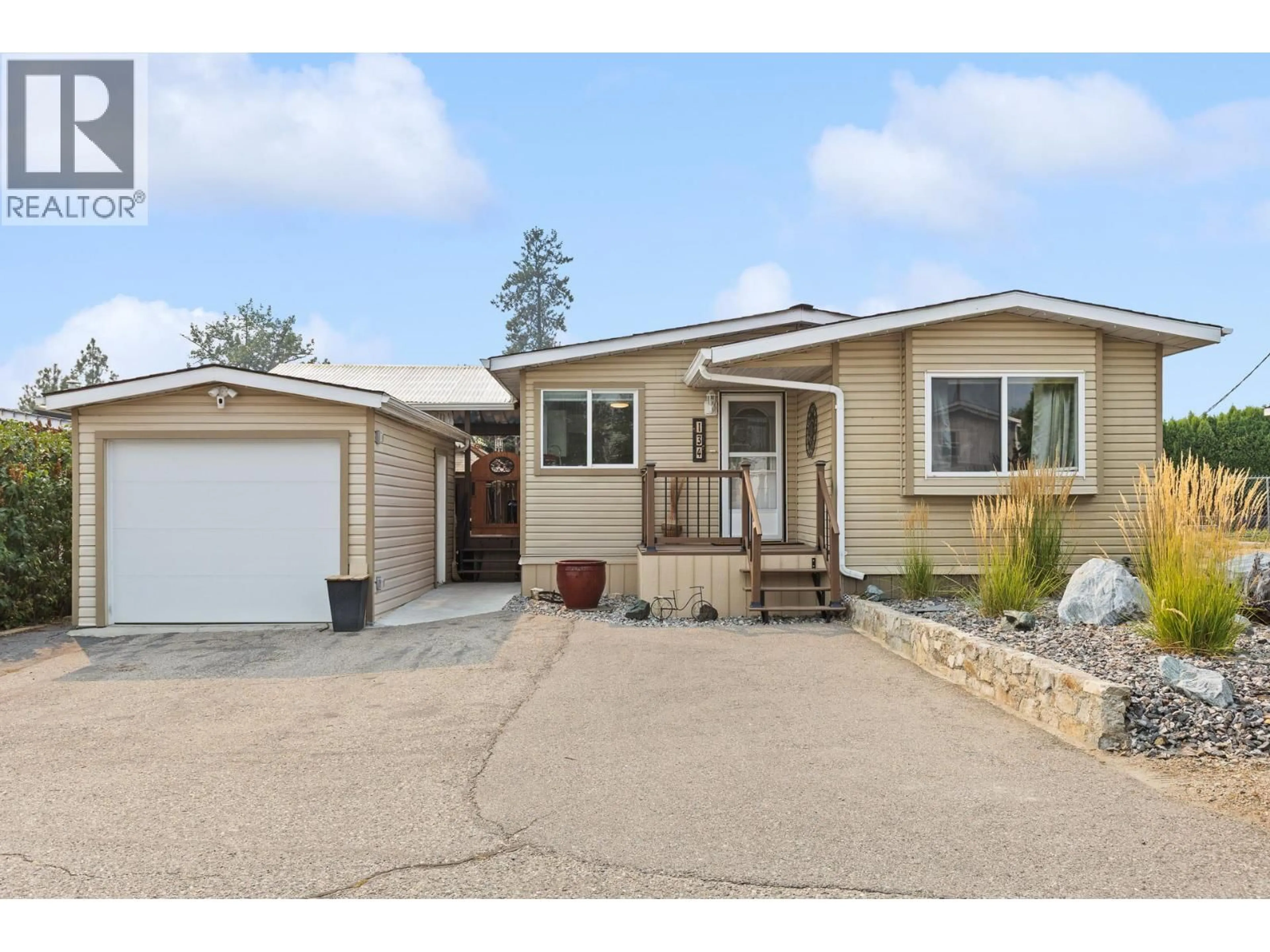 Home with vinyl exterior material, street for 134 - 9020 JIM BAILEY ROAD, Kelowna British Columbia V4V1E5