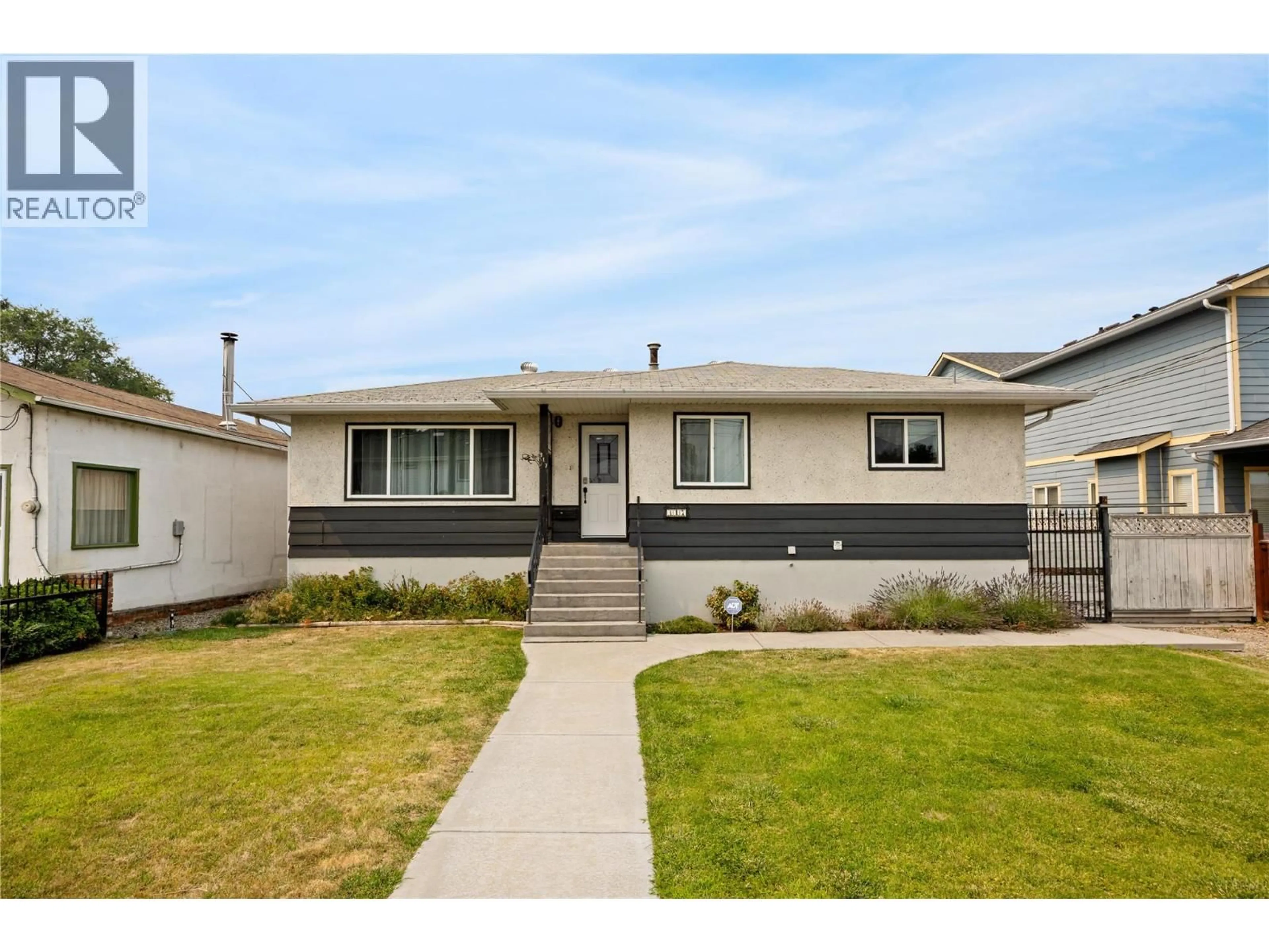 Home with vinyl exterior material, street for 317 HAYNES STREET, Penticton British Columbia V2A5S1