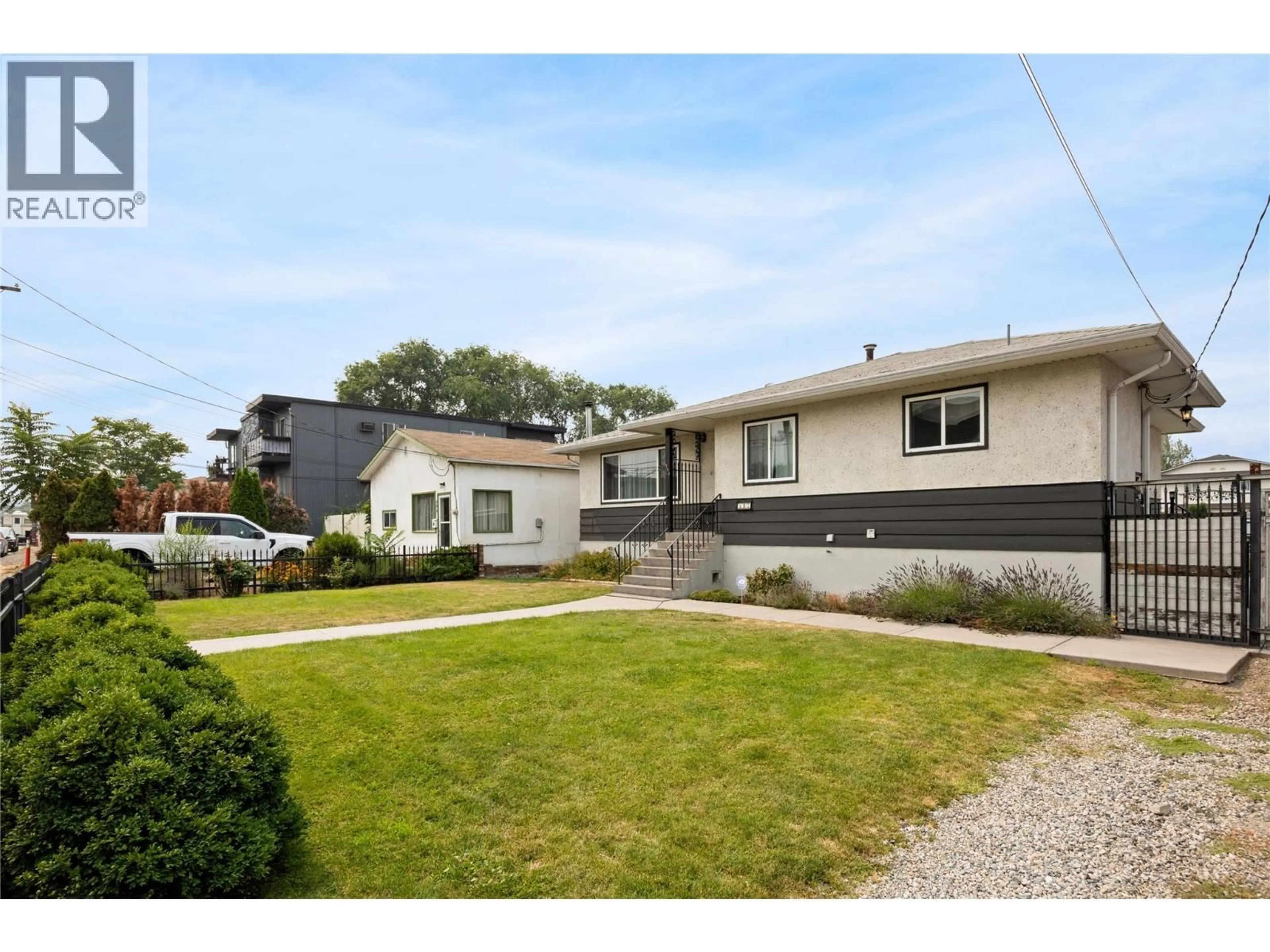 Home with vinyl exterior material, street for 317 HAYNES STREET, Penticton British Columbia V2A5S1