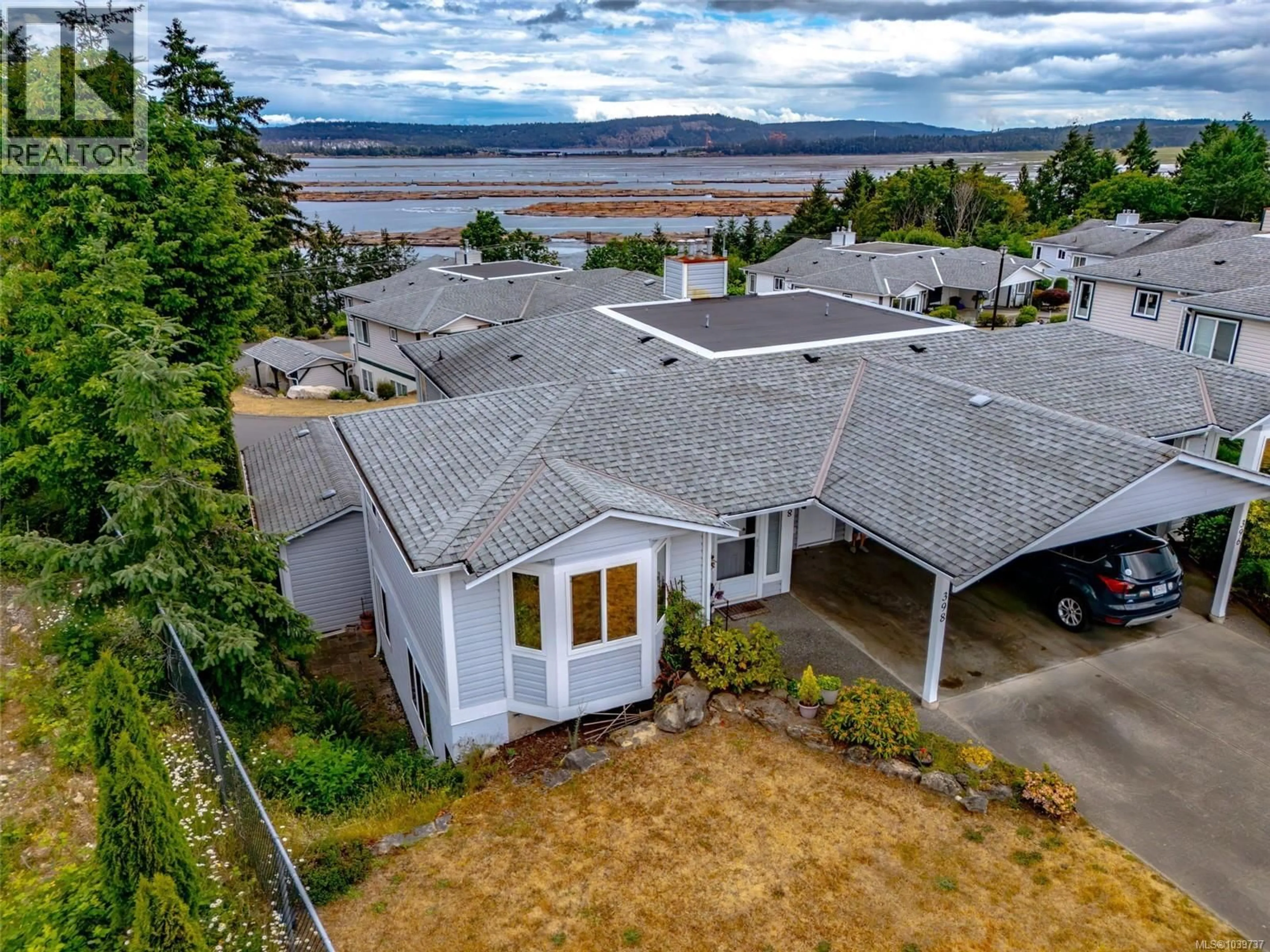 A pic from outside/outdoor area/front of a property/back of a property/a pic from drone, water/lake/river/ocean view for 398 PETROGLYPH CRESCENT, Nanaimo British Columbia V9R5K1