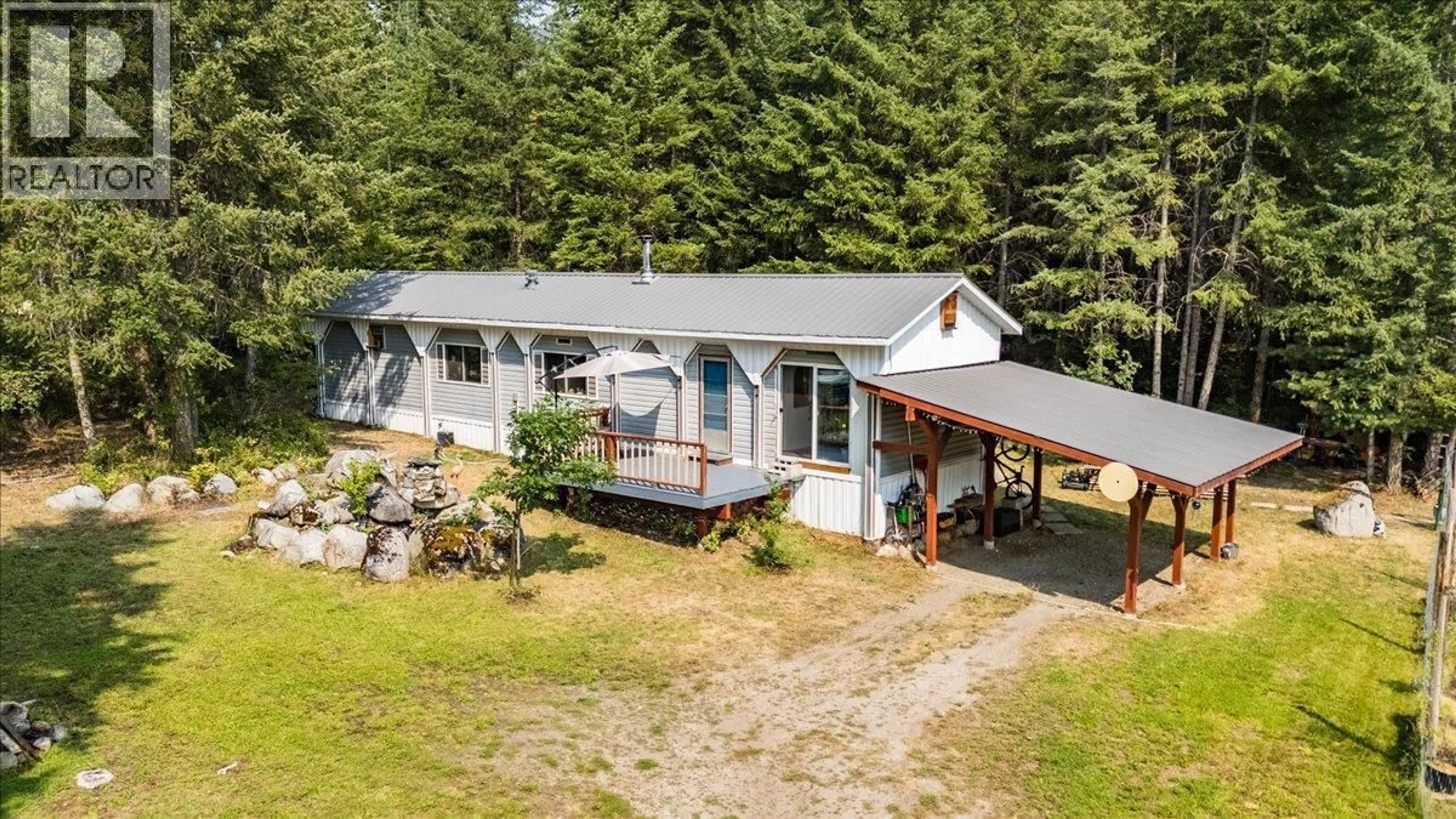 A pic from outside/outdoor area/front of a property/back of a property/a pic from drone, unknown for 8864 SLOCAN  S ROAD, Slocan British Columbia V0G2C0