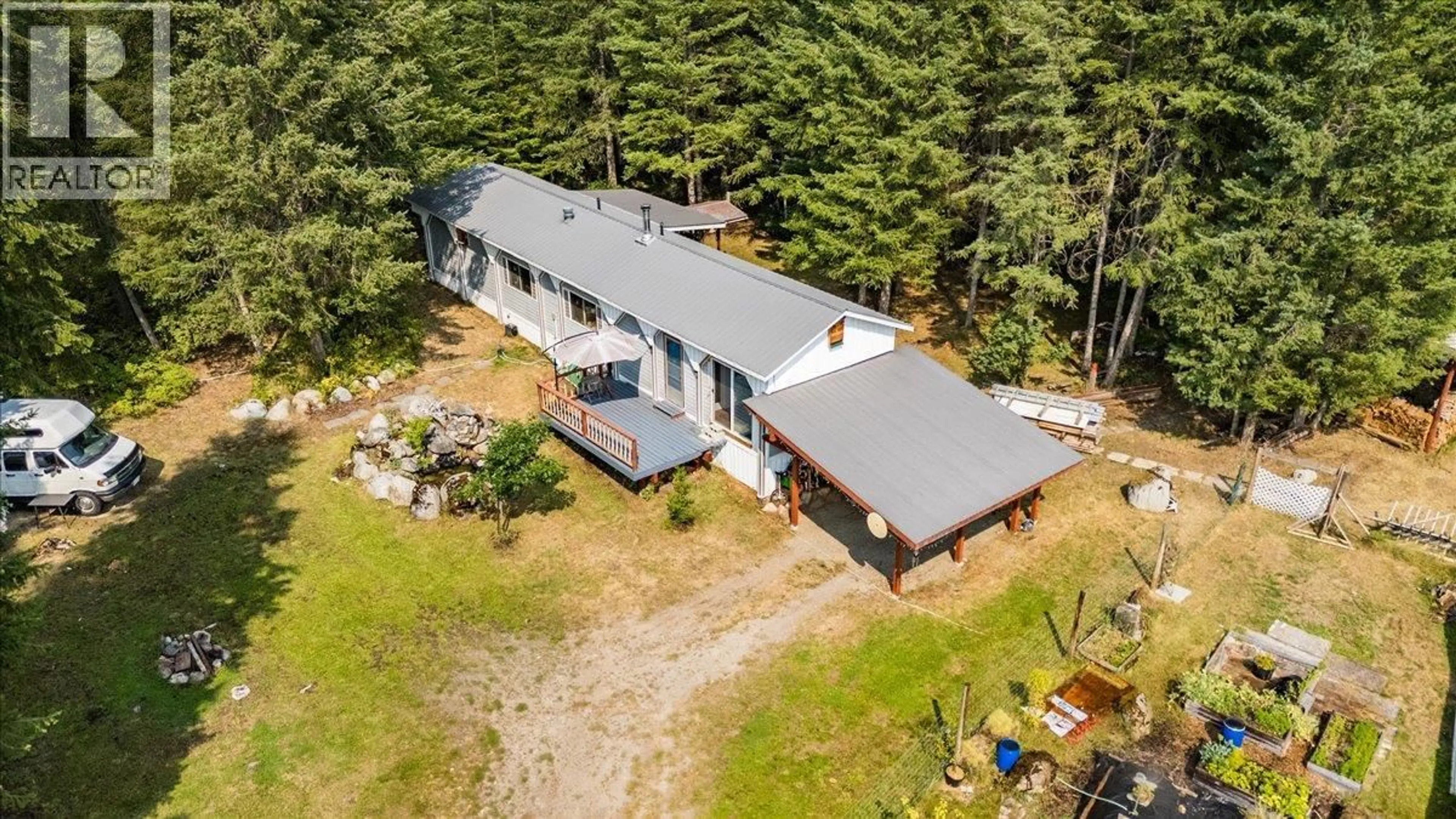 A pic from outside/outdoor area/front of a property/back of a property/a pic from drone, building for 8864 SLOCAN S ROAD, Slocan British Columbia V0G2C0
