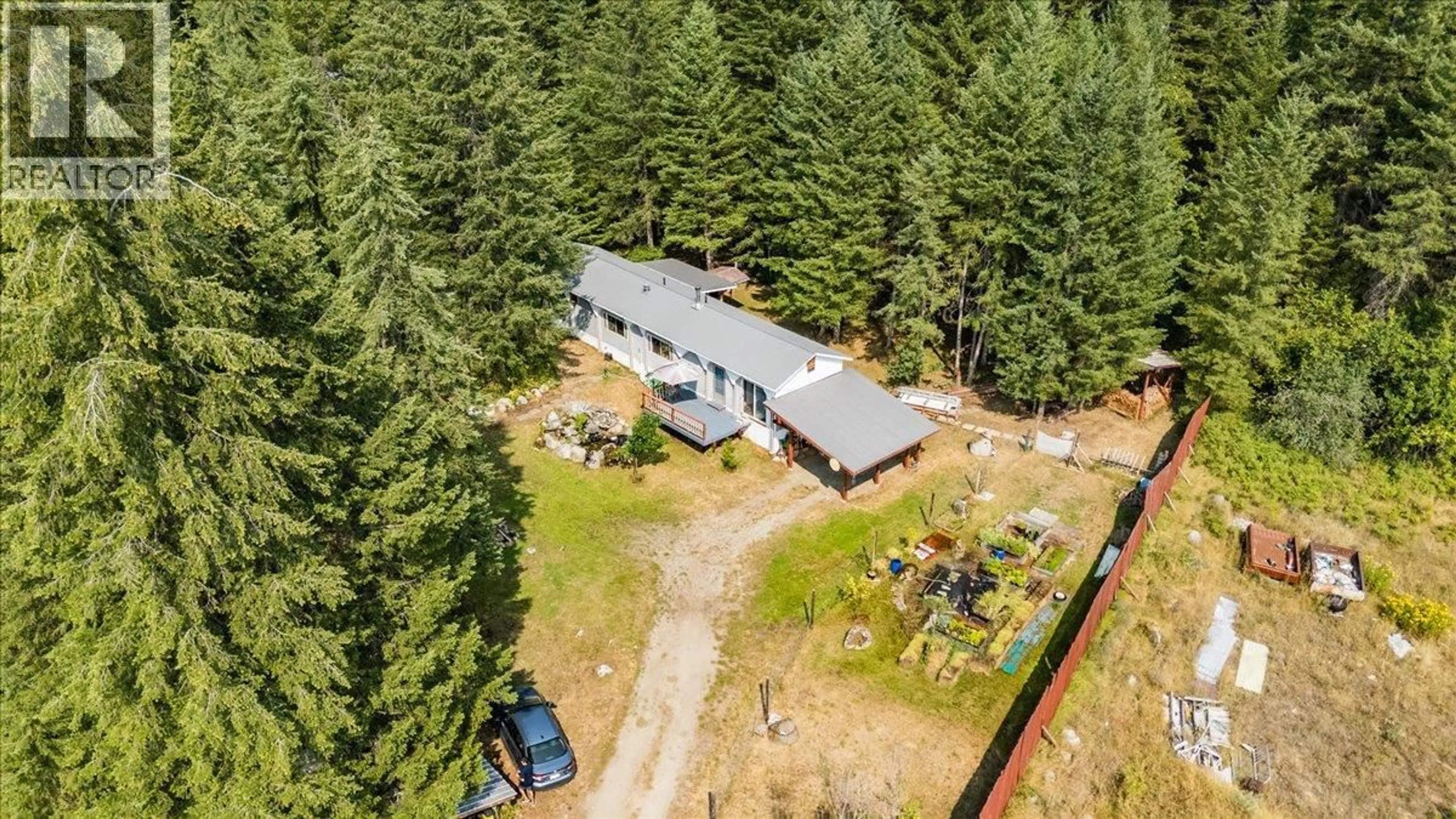 A pic from outside/outdoor area/front of a property/back of a property/a pic from drone, forest/trees view for 8864 SLOCAN S ROAD, Slocan British Columbia V0G2C0