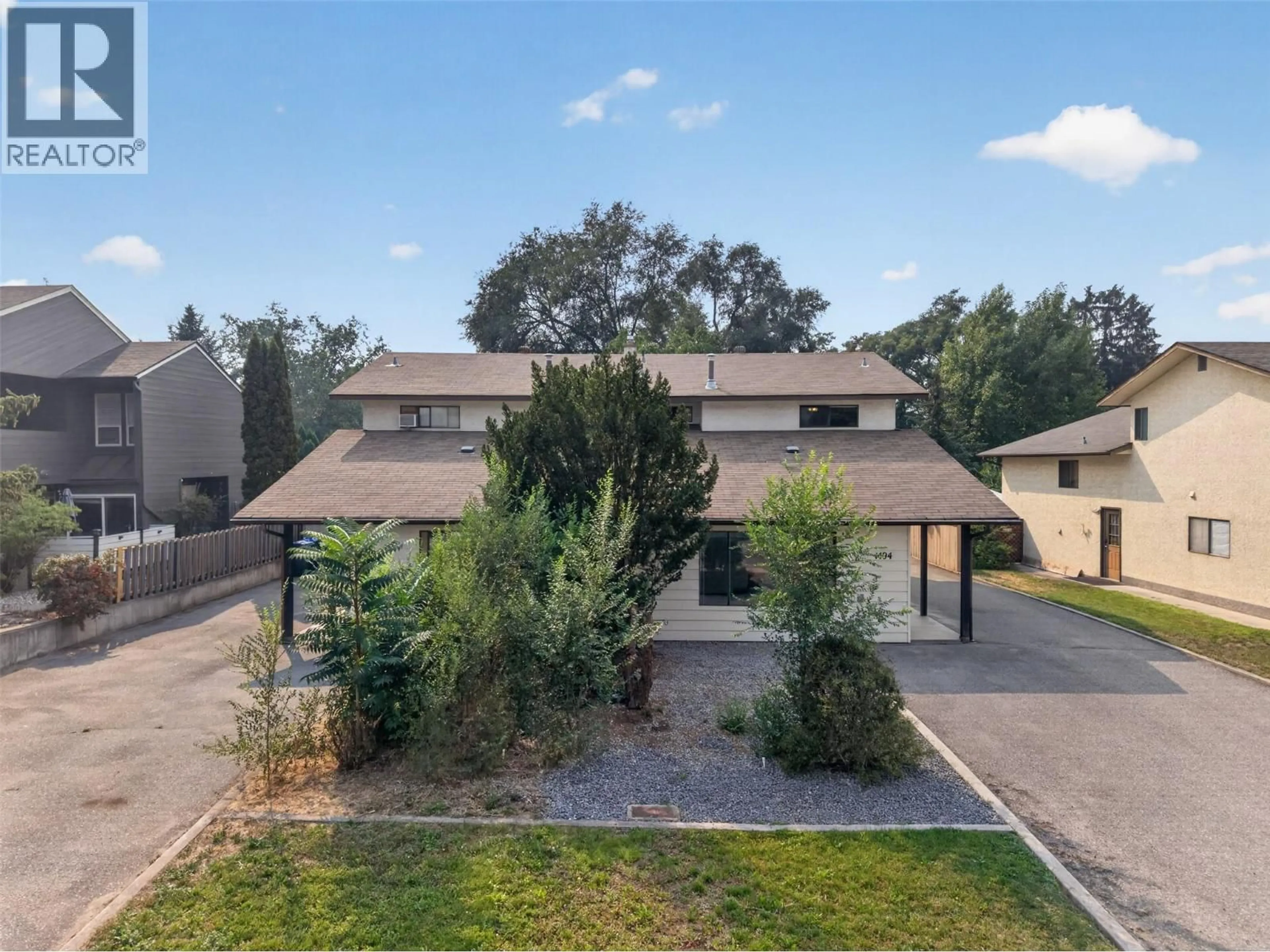 A pic from outside/outdoor area/front of a property/back of a property/a pic from drone, street for 1494/1496 ELM STREET, Kelowna British Columbia V1Y3W9