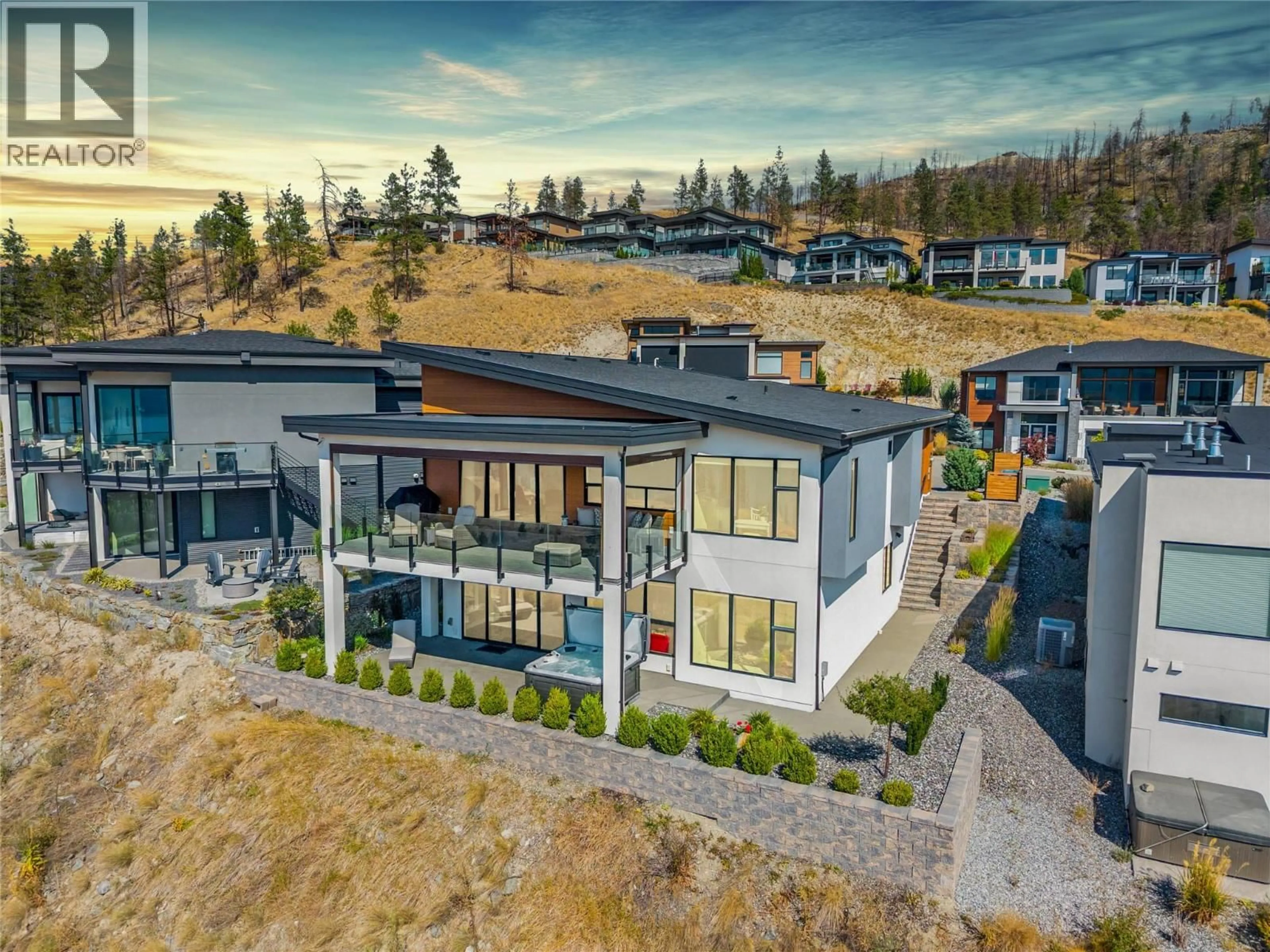A pic from outside/outdoor area/front of a property/back of a property/a pic from drone, mountain view for 9814 BEACON HILL CRESCENT, Lake Country British Columbia V4V0A9