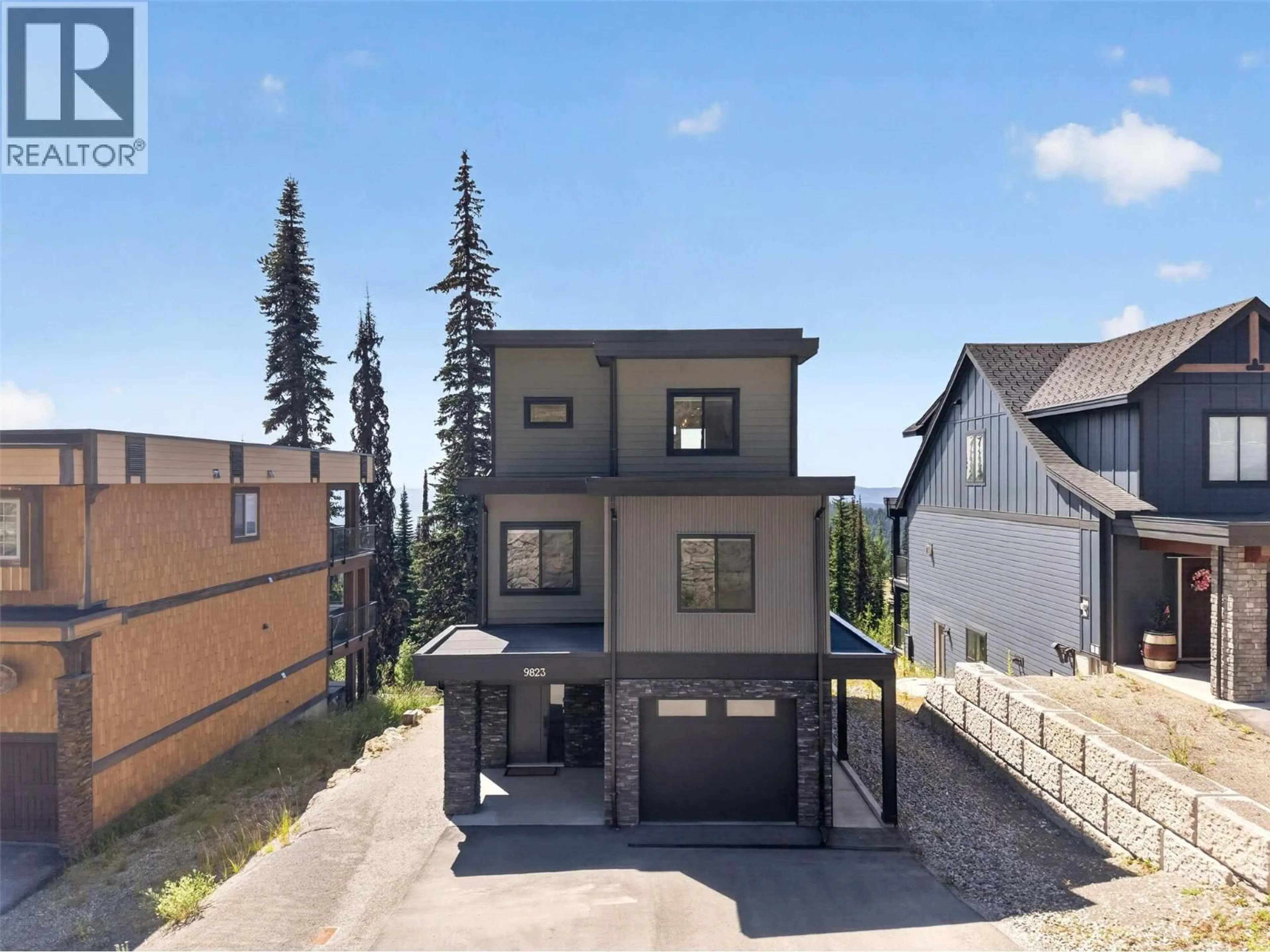 A pic from outside/outdoor area/front of a property/back of a property/a pic from drone, street for 9823 CATHEDRAL DRIVE, Silver Star British Columbia V1B0S1