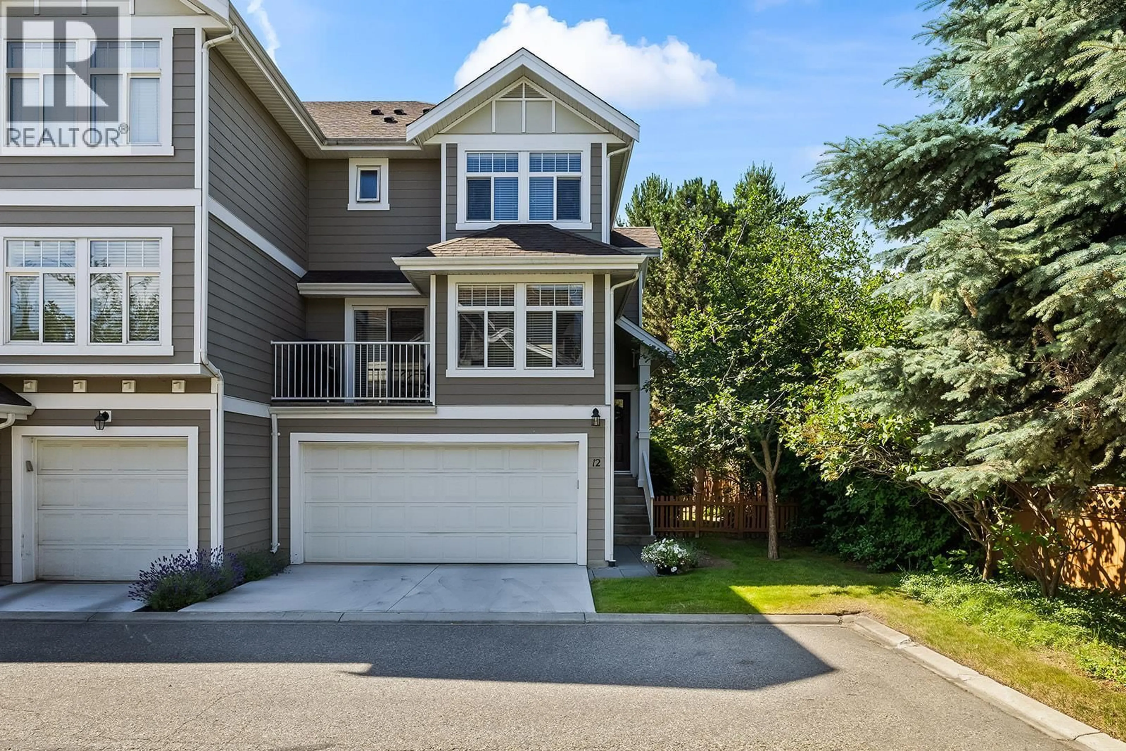 Home with vinyl exterior material, street for 12 - 1853 PARKVIEW CRESCENT, Kelowna British Columbia V1X8A3