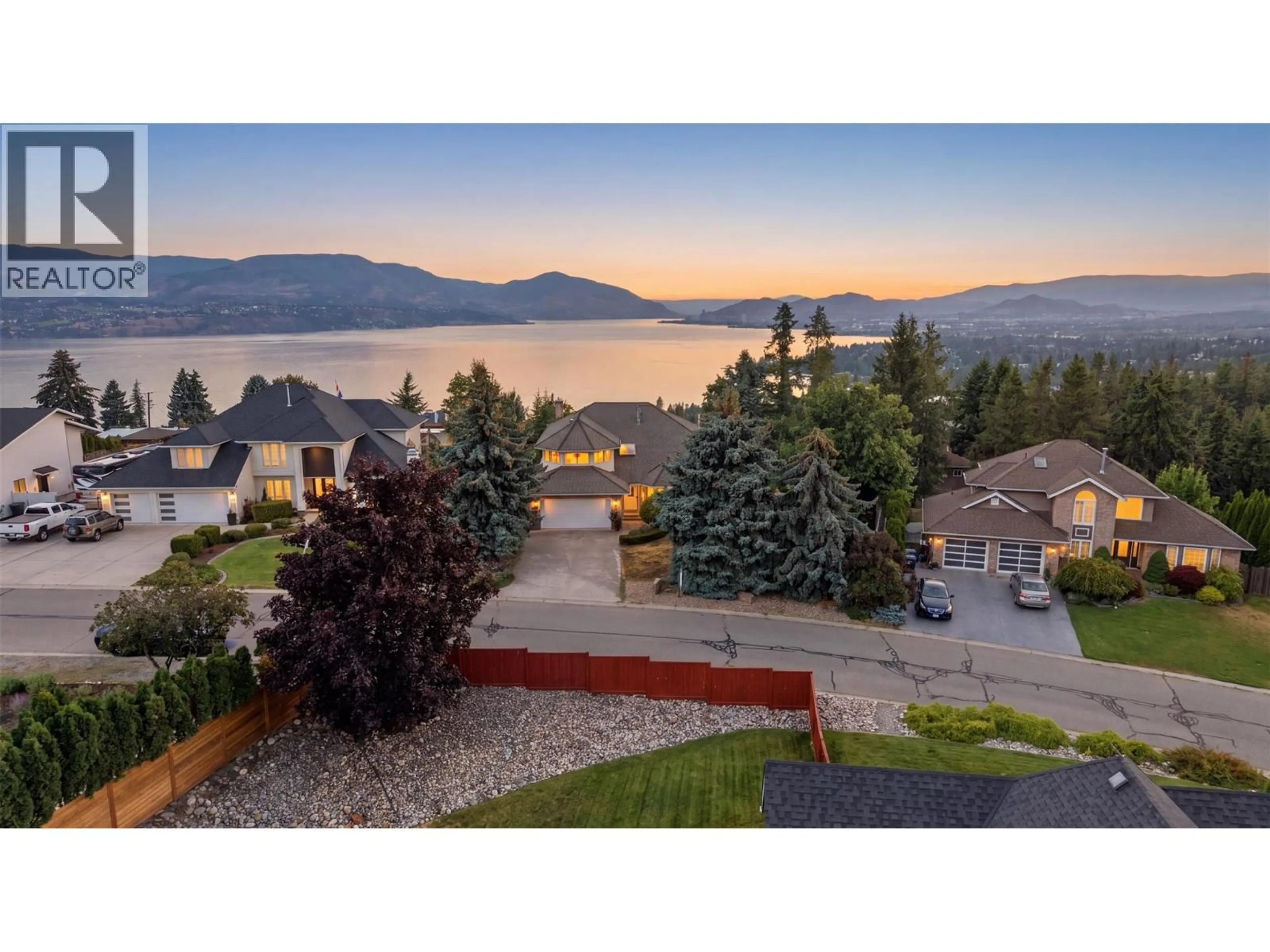 A pic from outside/outdoor area/front of a property/back of a property/a pic from drone, mountain view for 411 CURLEW DRIVE, Kelowna British Columbia V1W4L3