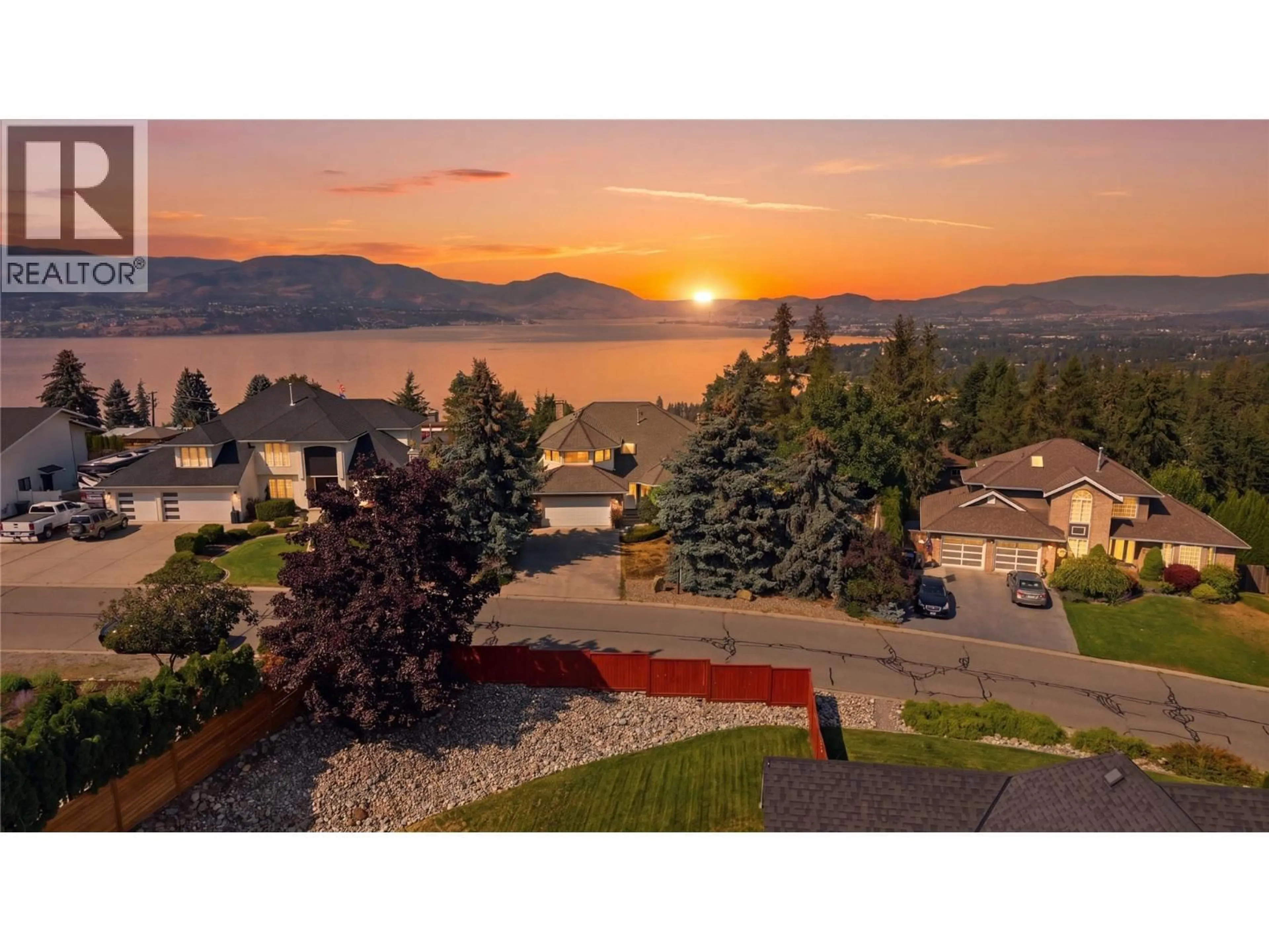 A pic from outside/outdoor area/front of a property/back of a property/a pic from drone, mountain view for 411 CURLEW DRIVE, Kelowna British Columbia V1W4L3