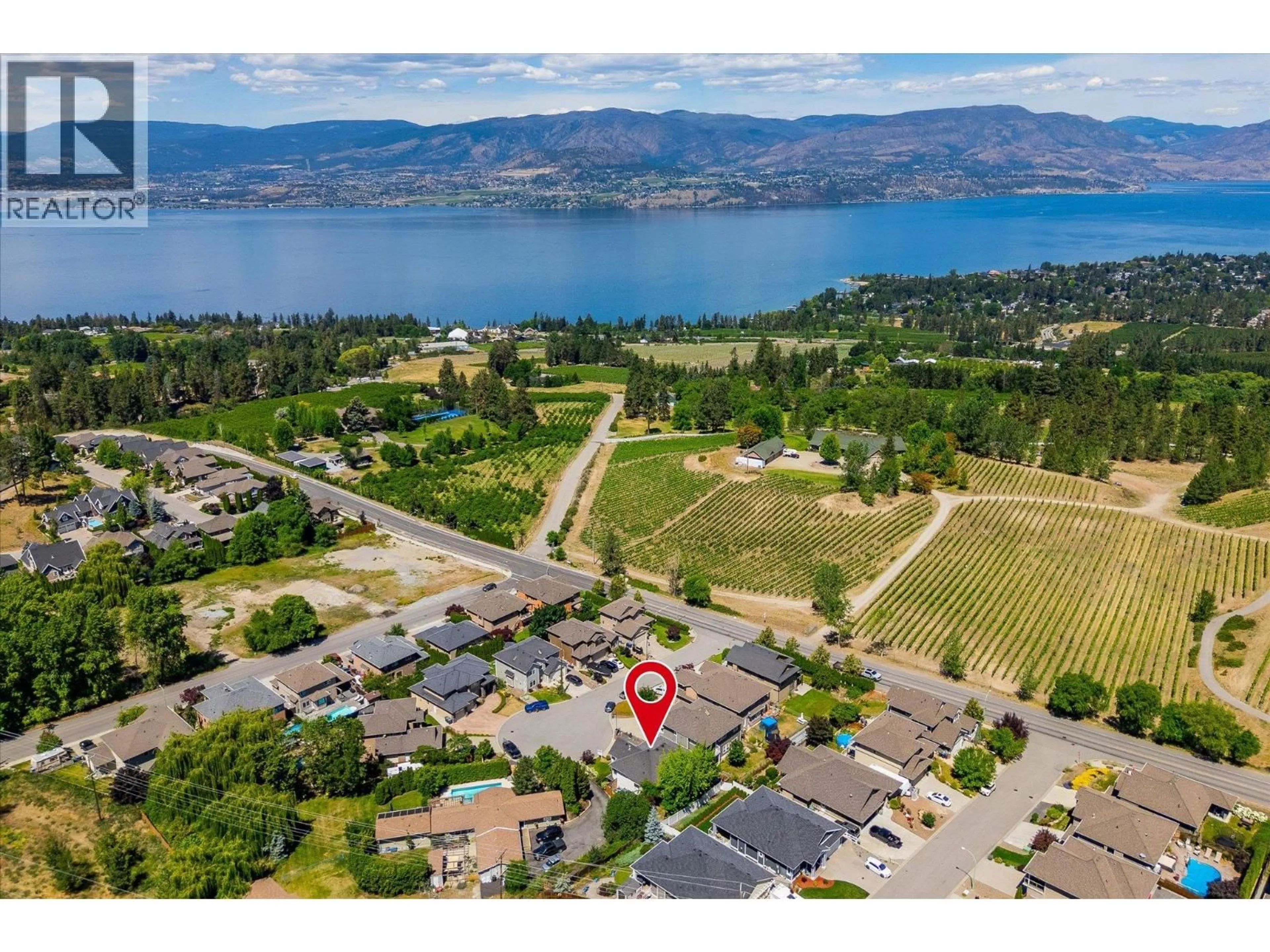 A pic from outside/outdoor area/front of a property/back of a property/a pic from drone, water/lake/river/ocean view for 5027 FRANCE COURT, Kelowna British Columbia V1W4M4