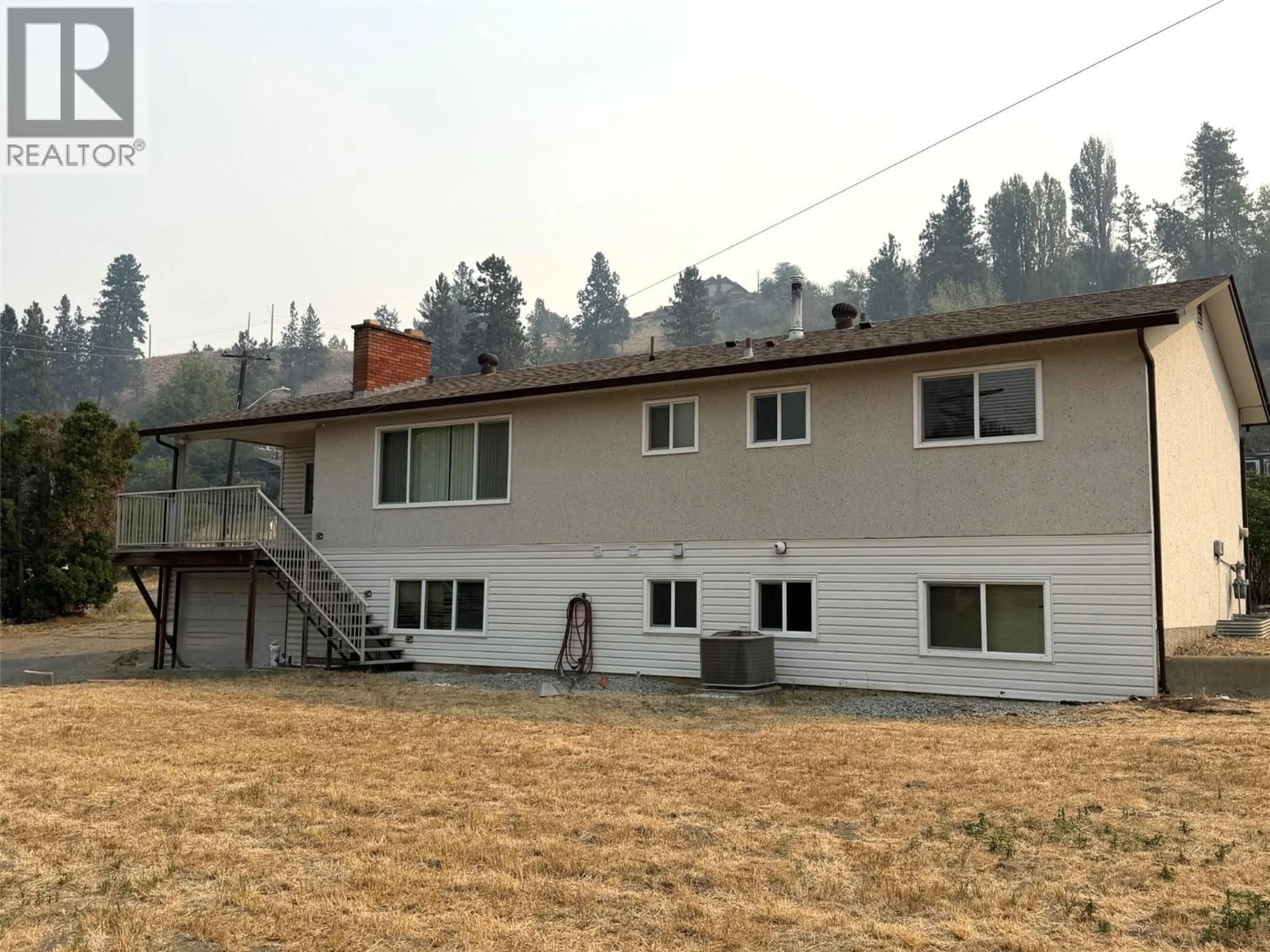 A pic from outside/outdoor area/front of a property/back of a property/a pic from drone, building for 2000 HOLLYWOOD ROAD SOUTH, Kelowna British Columbia V1X4P6