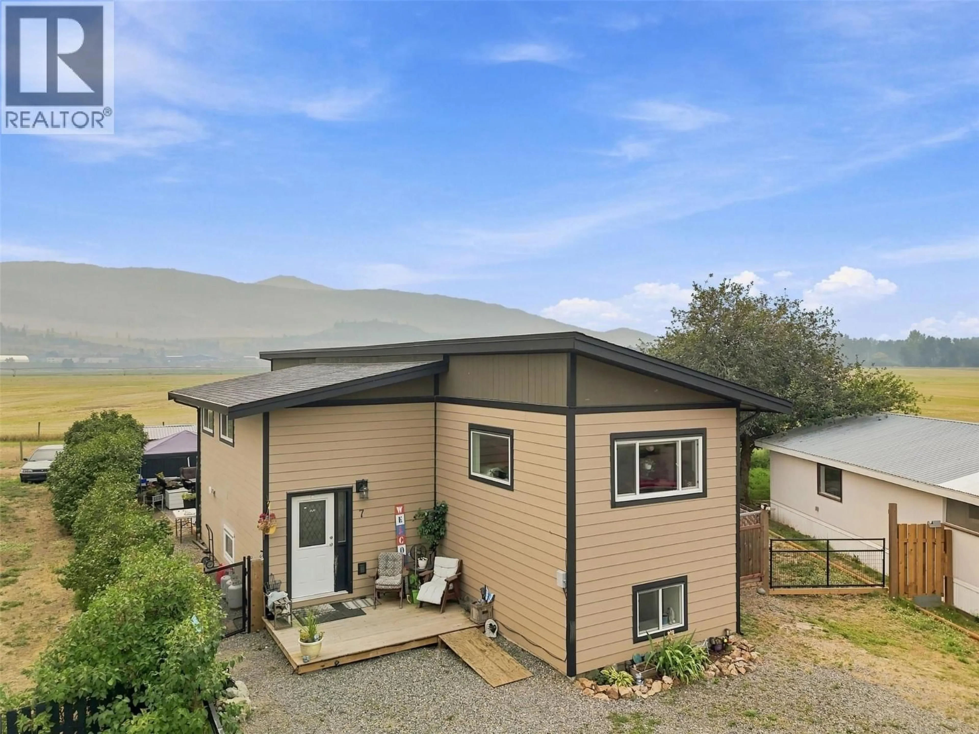 A pic from outside/outdoor area/front of a property/back of a property/a pic from drone, mountain view for 7 - 159 ZIRNHELT ROAD, Kamloops British Columbia V2H3B0