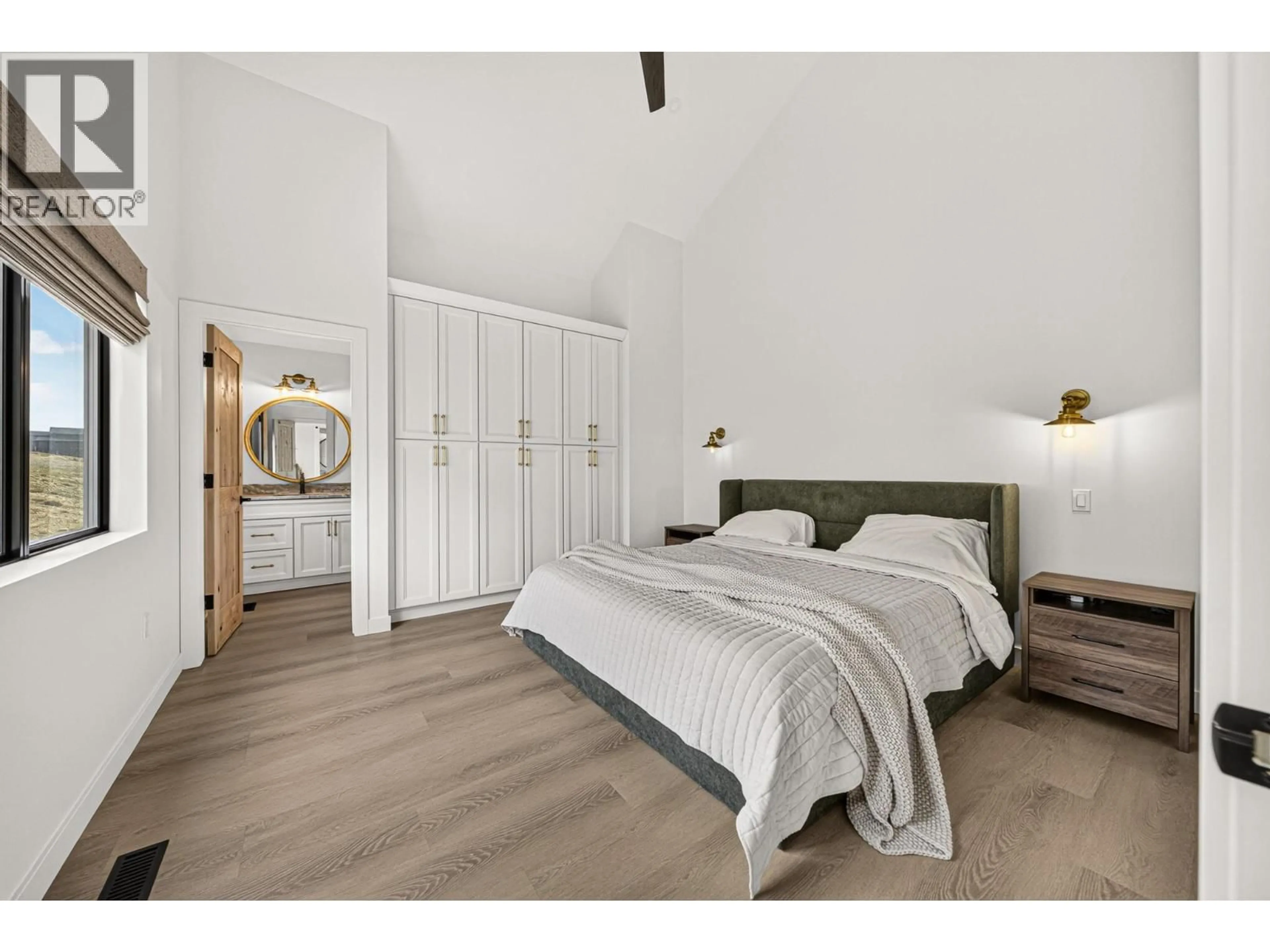 Bedroom with bed, wood/laminate floor for 1731 MARINA ESTATES ROAD, Lake Koocanusa British Columbia V0B1T4
