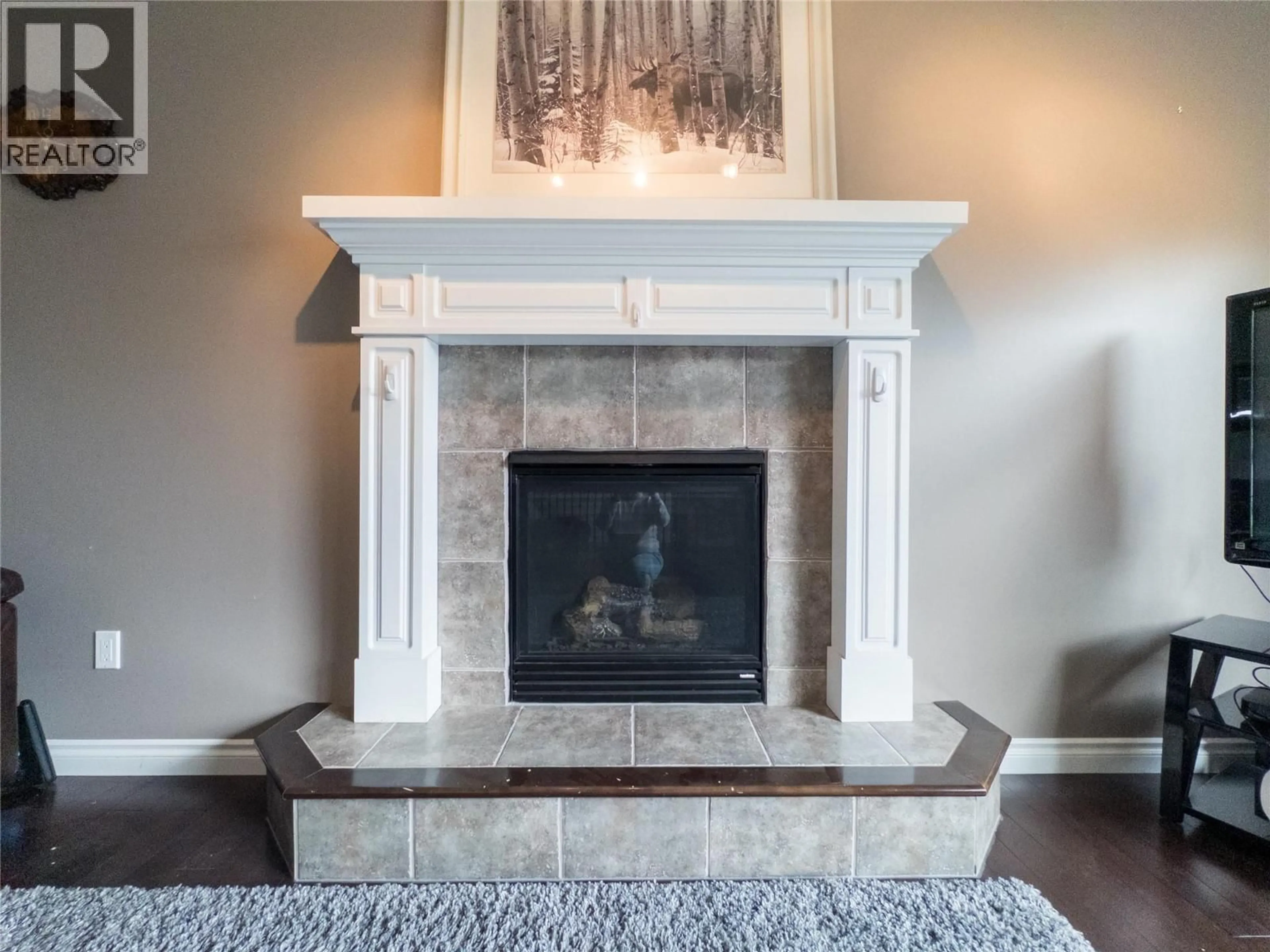 Living room with furniture, ceramic/tile floor for 8705 18 STREET, Dawson Creek British Columbia V1G0B3