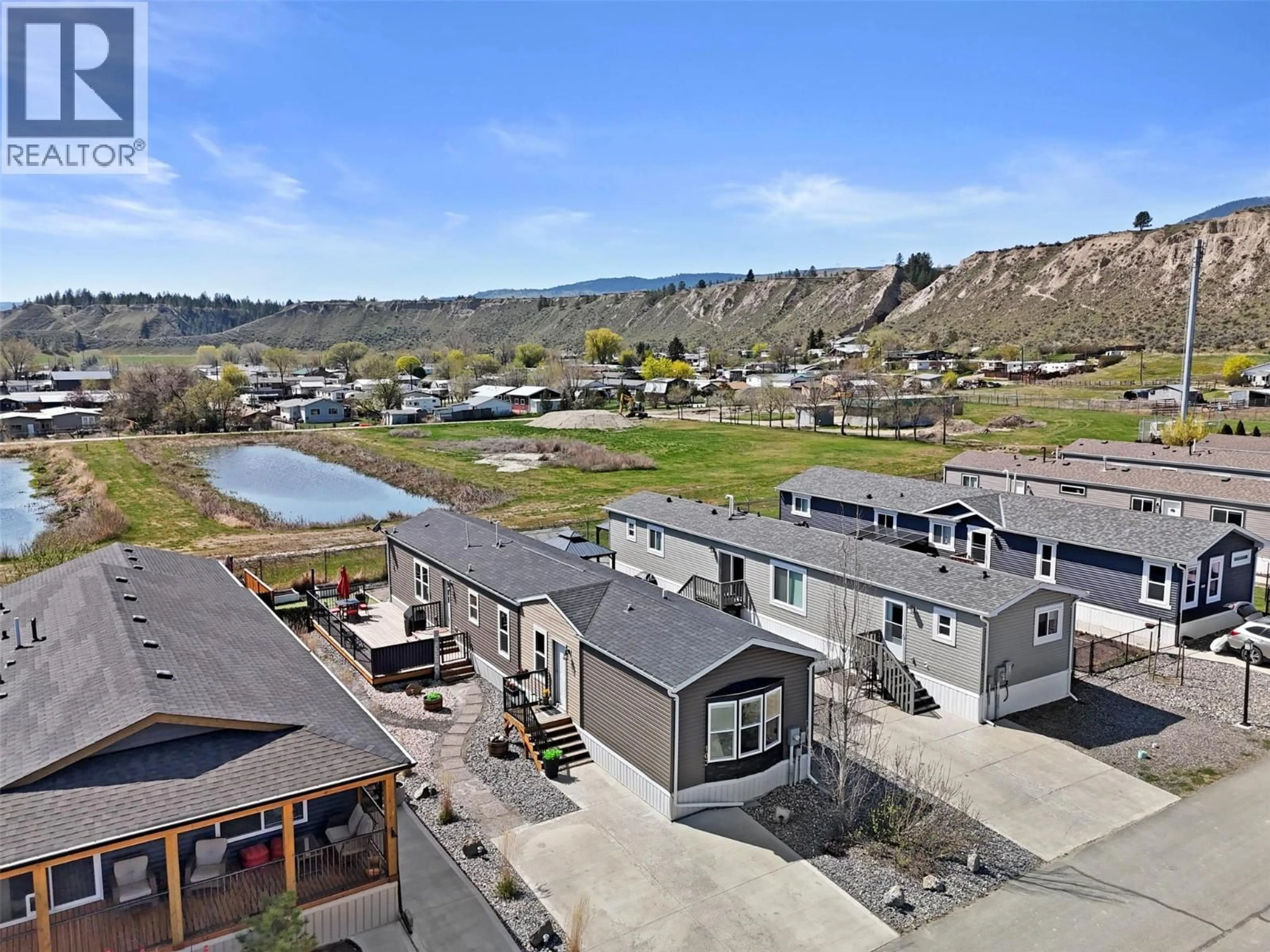 A pic from outside/outdoor area/front of a property/back of a property/a pic from drone, water/lake/river/ocean view for 103 - 5005 RIVER ROAD, Pritchard British Columbia V0E2P0