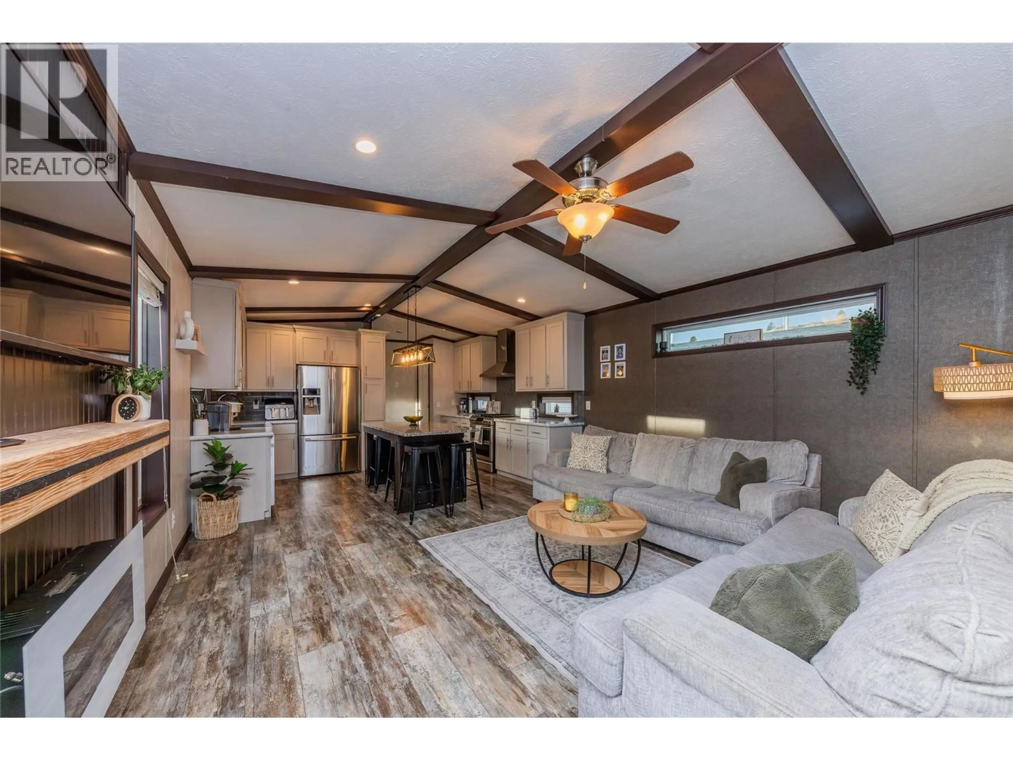 Open concept kitchen, wood/laminate floor for 103 - 5005 RIVER ROAD, Pritchard British Columbia V0E2P0