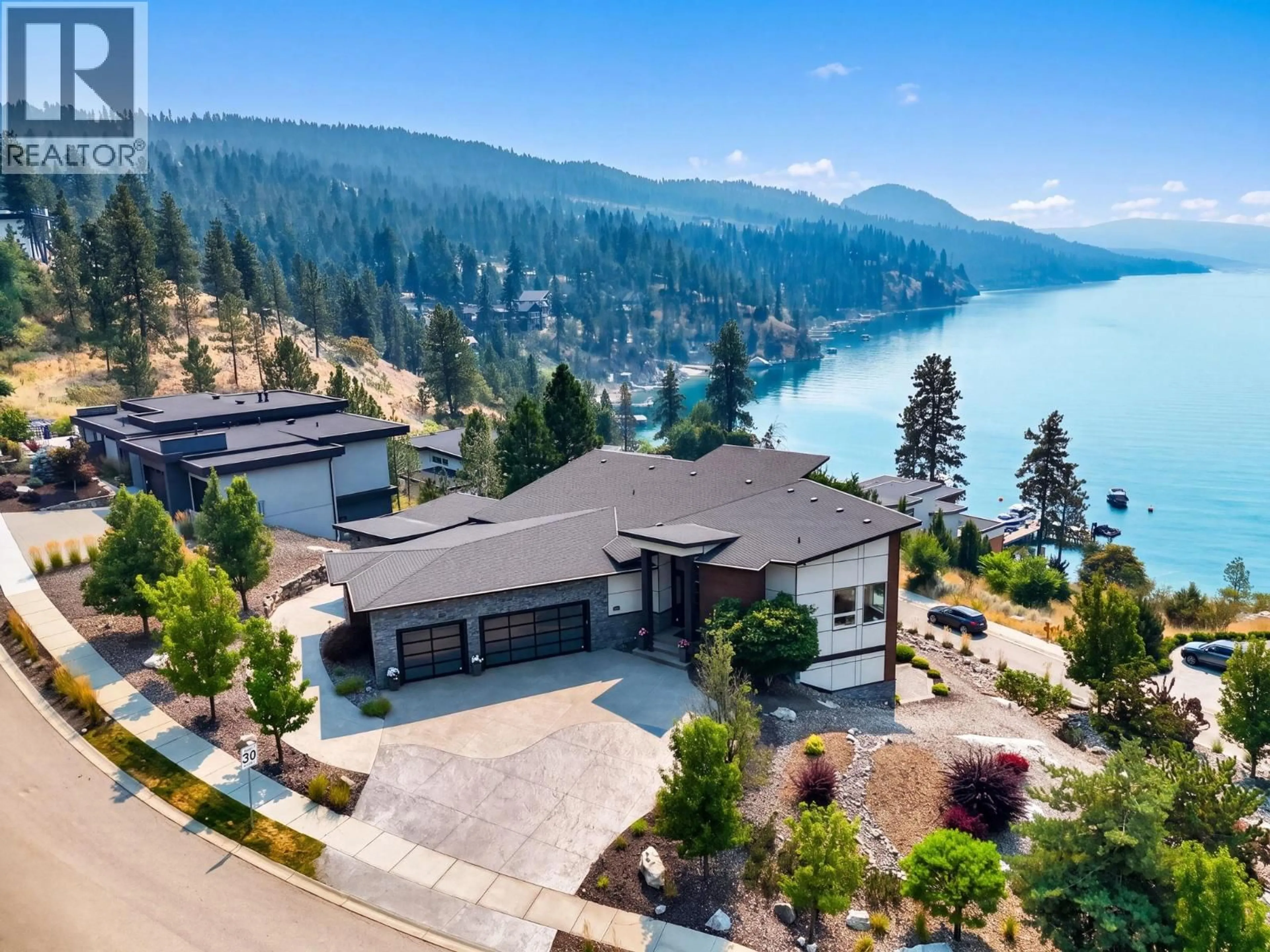 A pic from outside/outdoor area/front of a property/back of a property/a pic from drone, water/lake/river/ocean view for 1551 GRANITE ROAD, Lake Country British Columbia V4V1M9