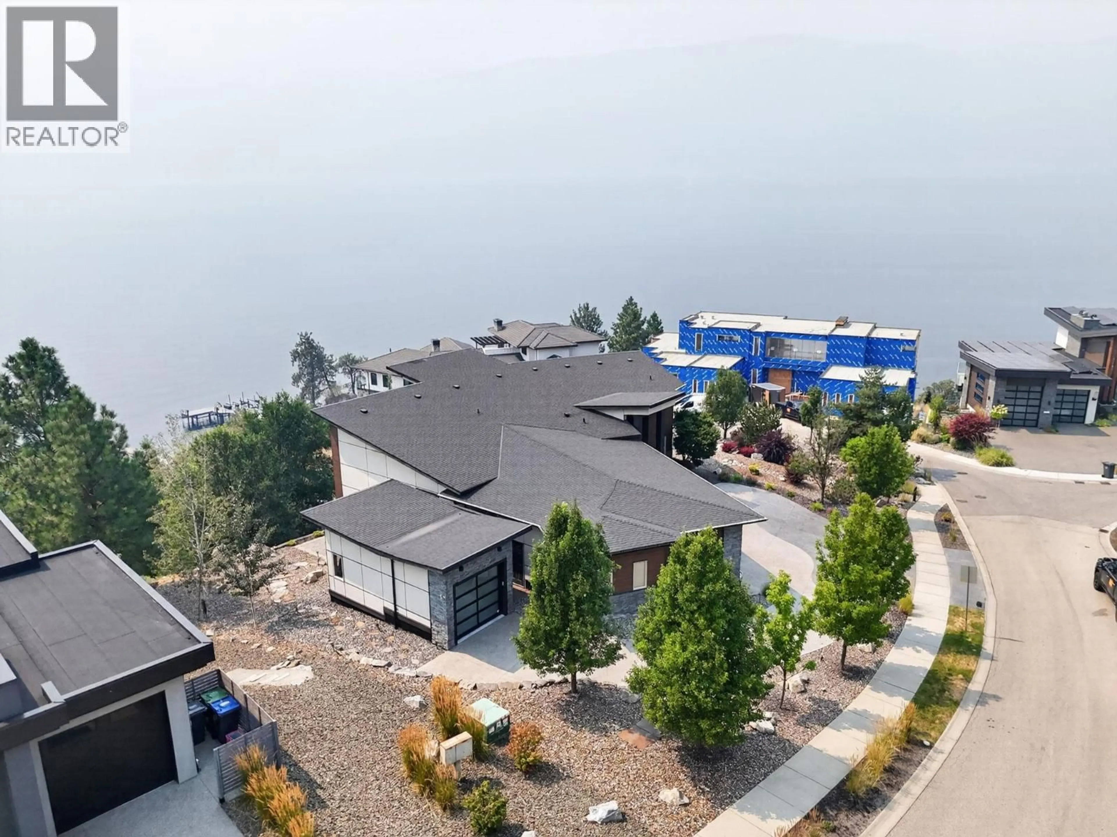 A pic from outside/outdoor area/front of a property/back of a property/a pic from drone, water/lake/river/ocean view for 1551 GRANITE ROAD, Lake Country British Columbia V4V1M9