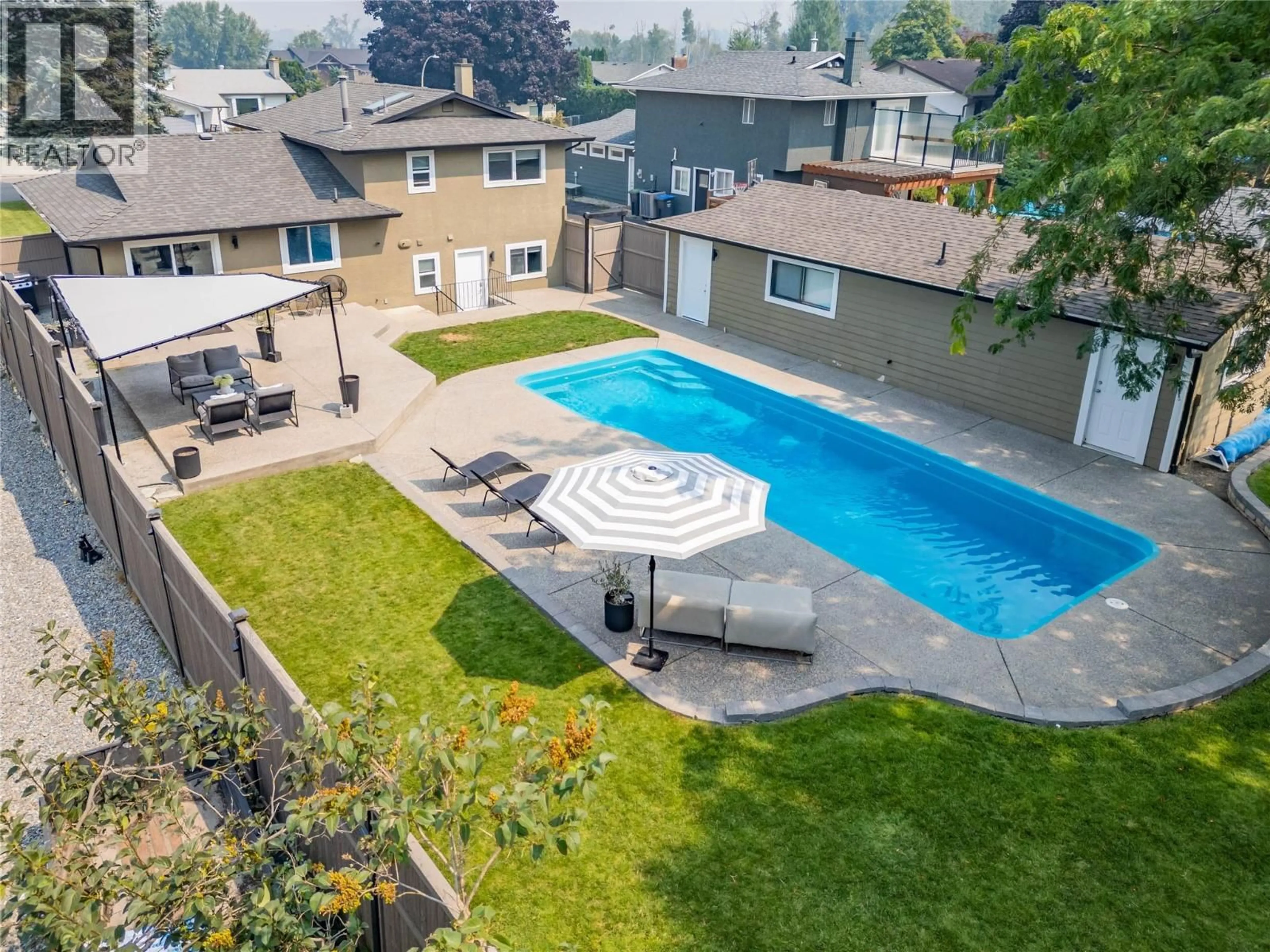 A pic from outside/outdoor area/front of a property/back of a property/a pic from drone, unknown for 741 TURNER ROAD, Kelowna British Columbia V1W2L1