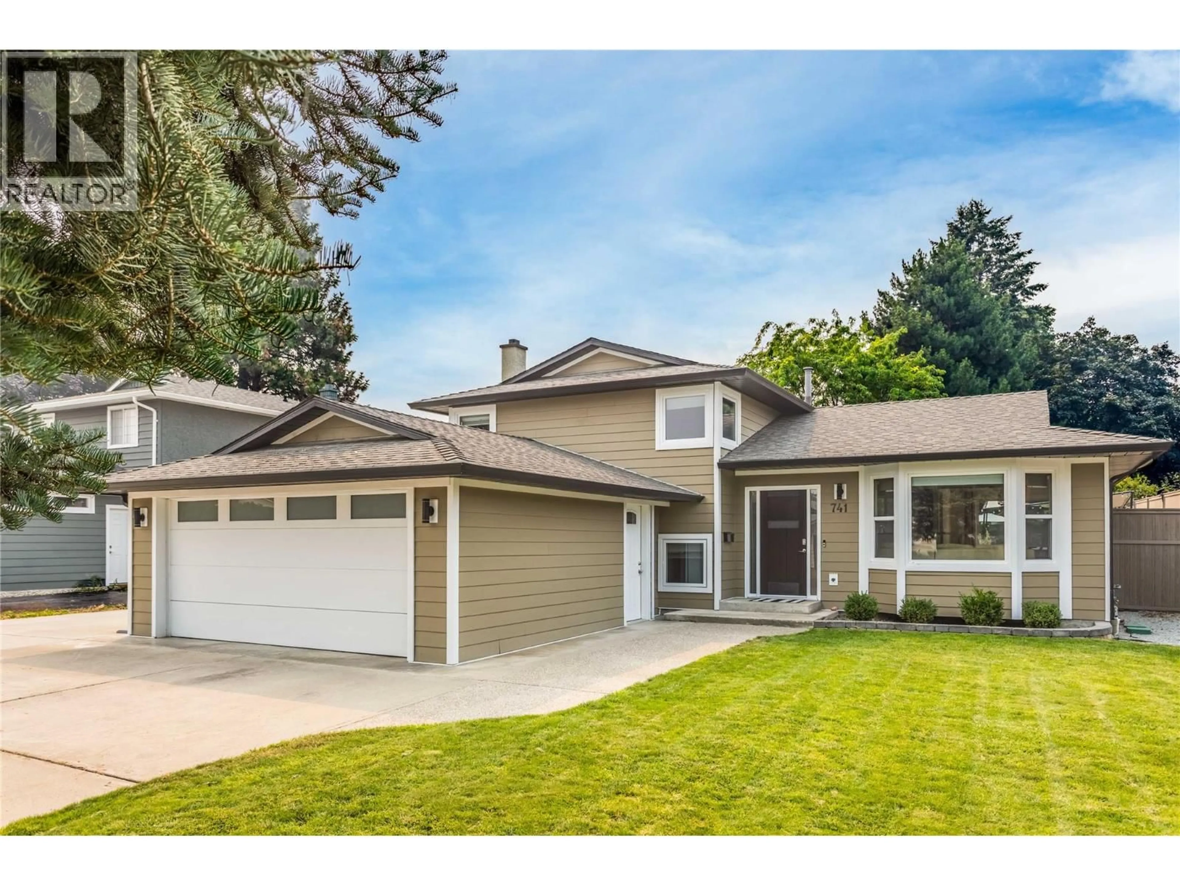 Home with vinyl exterior material, street for 741 TURNER ROAD, Kelowna British Columbia V1W2L1
