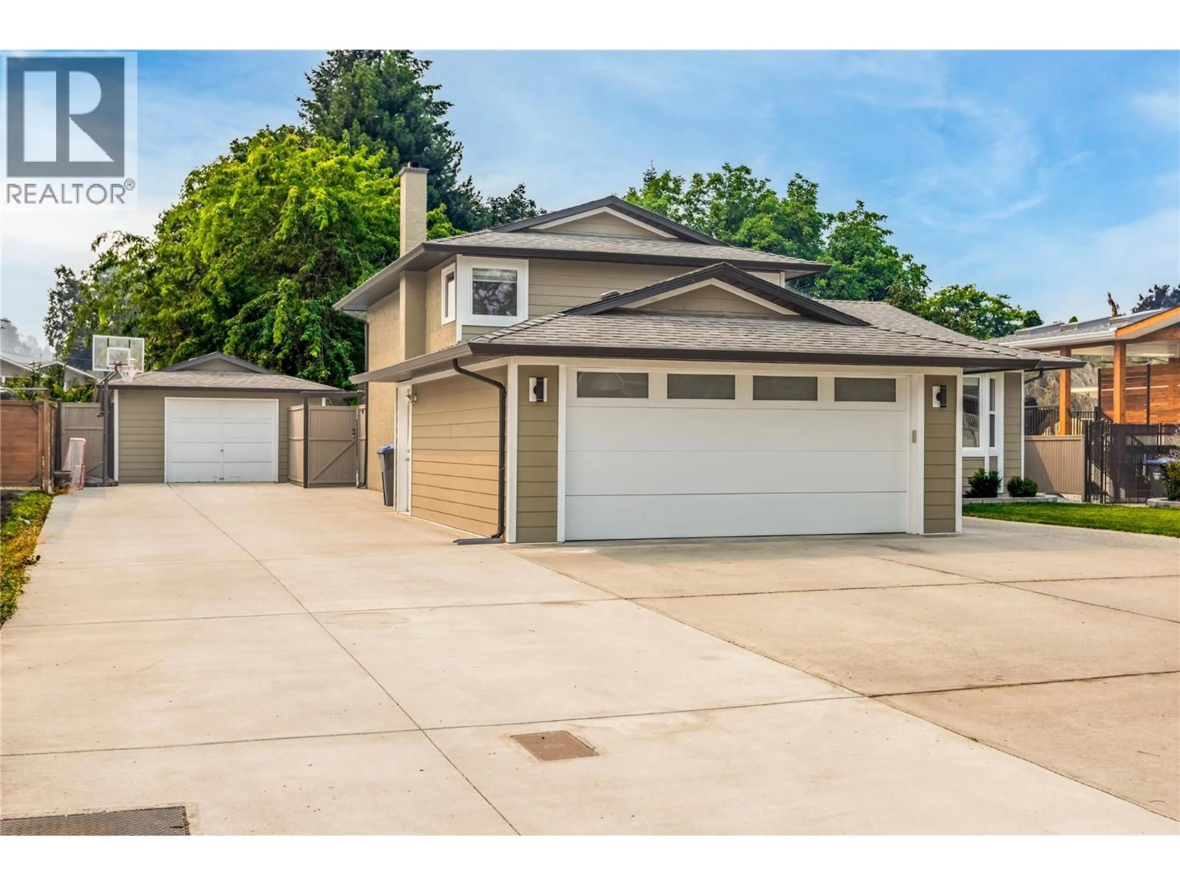 Home with vinyl exterior material, street for 741 TURNER ROAD, Kelowna British Columbia V1W2L1