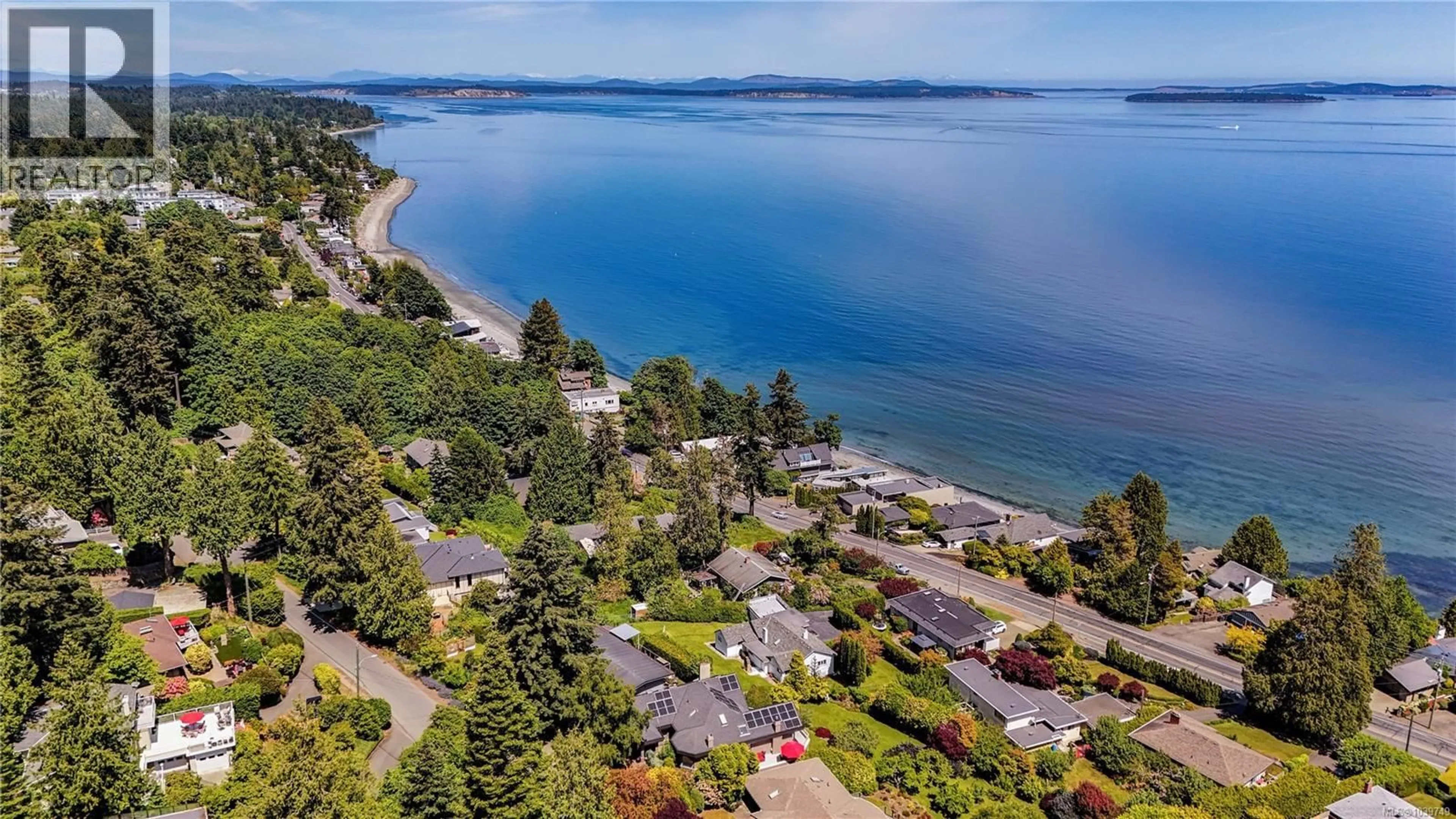 A pic from outside/outdoor area/front of a property/back of a property/a pic from drone, water/lake/river/ocean view for 4961 LOCHSIDE DRIVE, Saanich British Columbia V8Y2E6