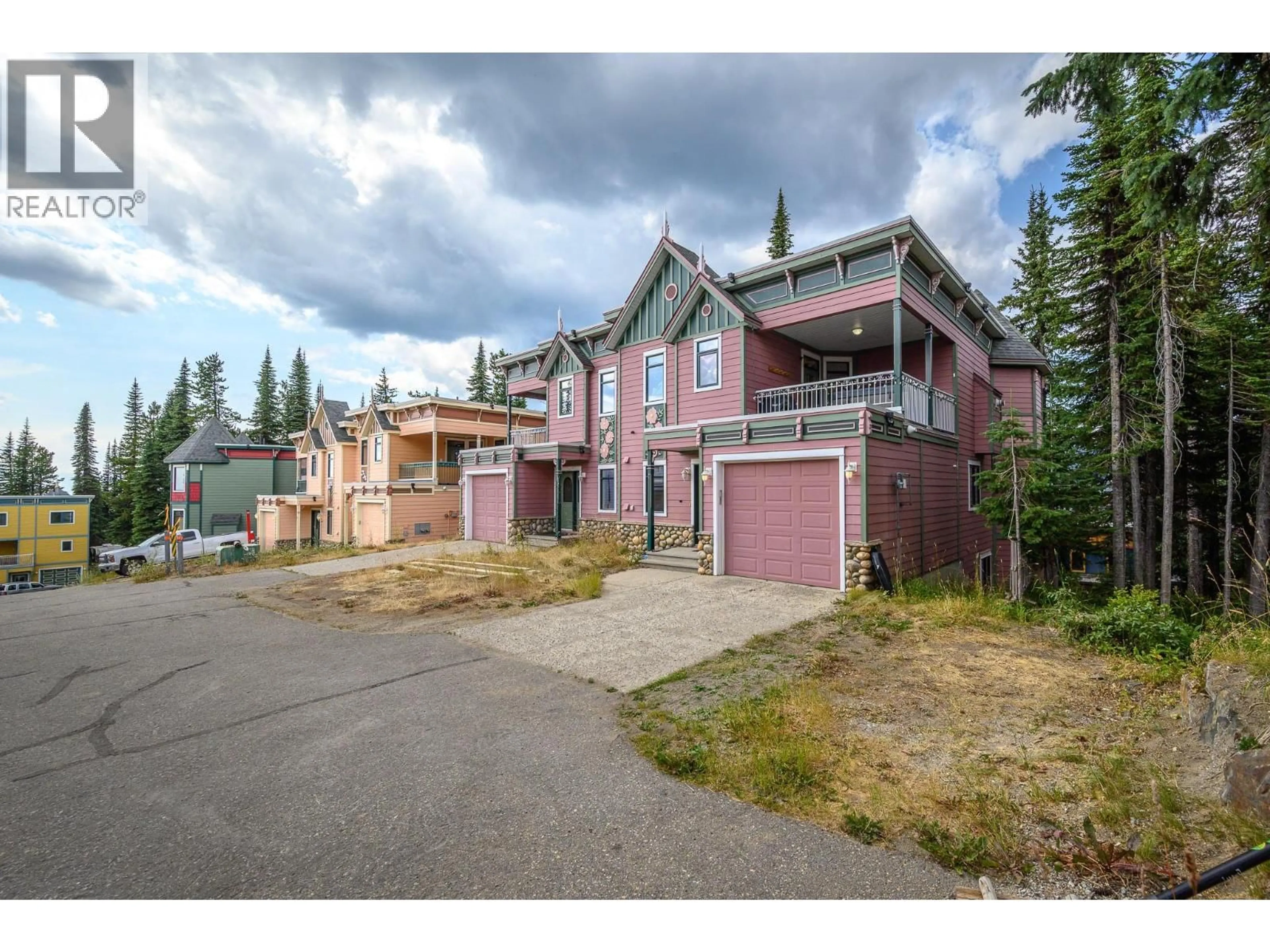 A pic from outside/outdoor area/front of a property/back of a property/a pic from drone, street for 7 - 635 MONASHEE ROAD, Silver Star British Columbia V1B3M1