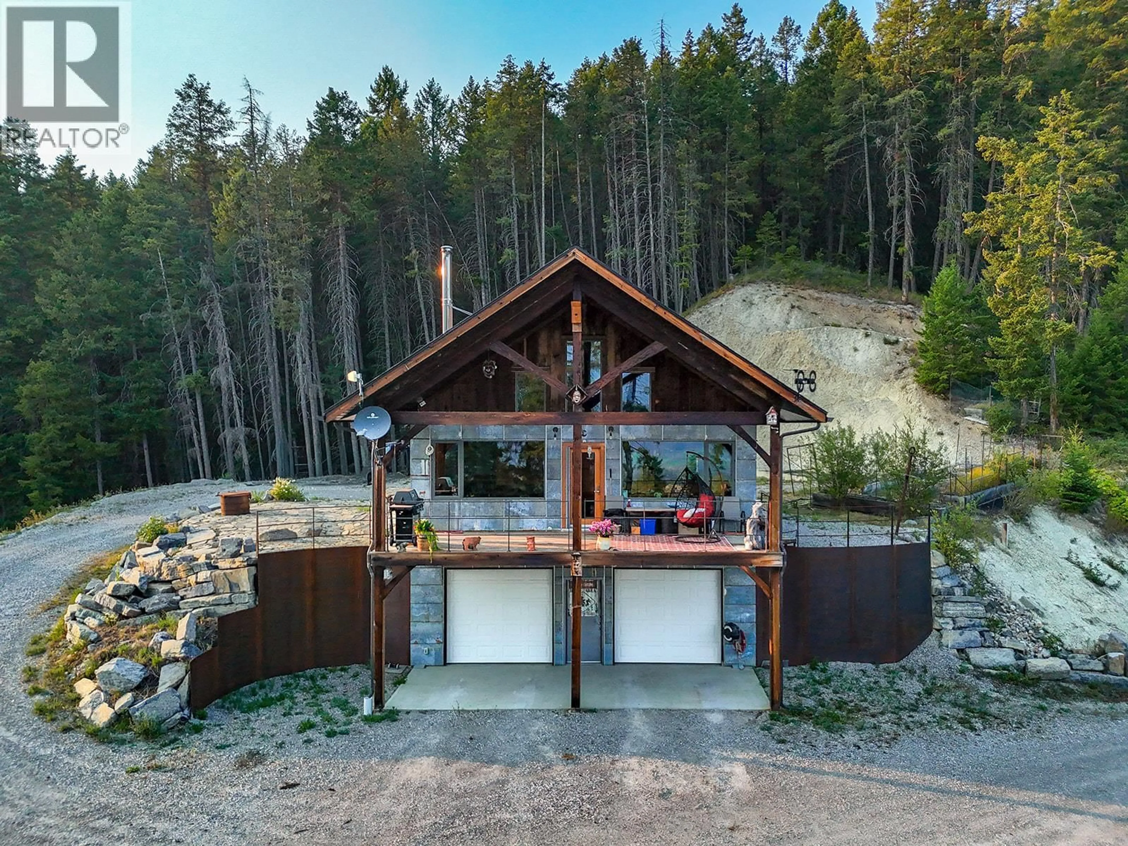A pic from outside/outdoor area/front of a property/back of a property/a pic from drone, forest/trees view for 2023 MCMURDO ROAD, Golden British Columbia V0A1H4