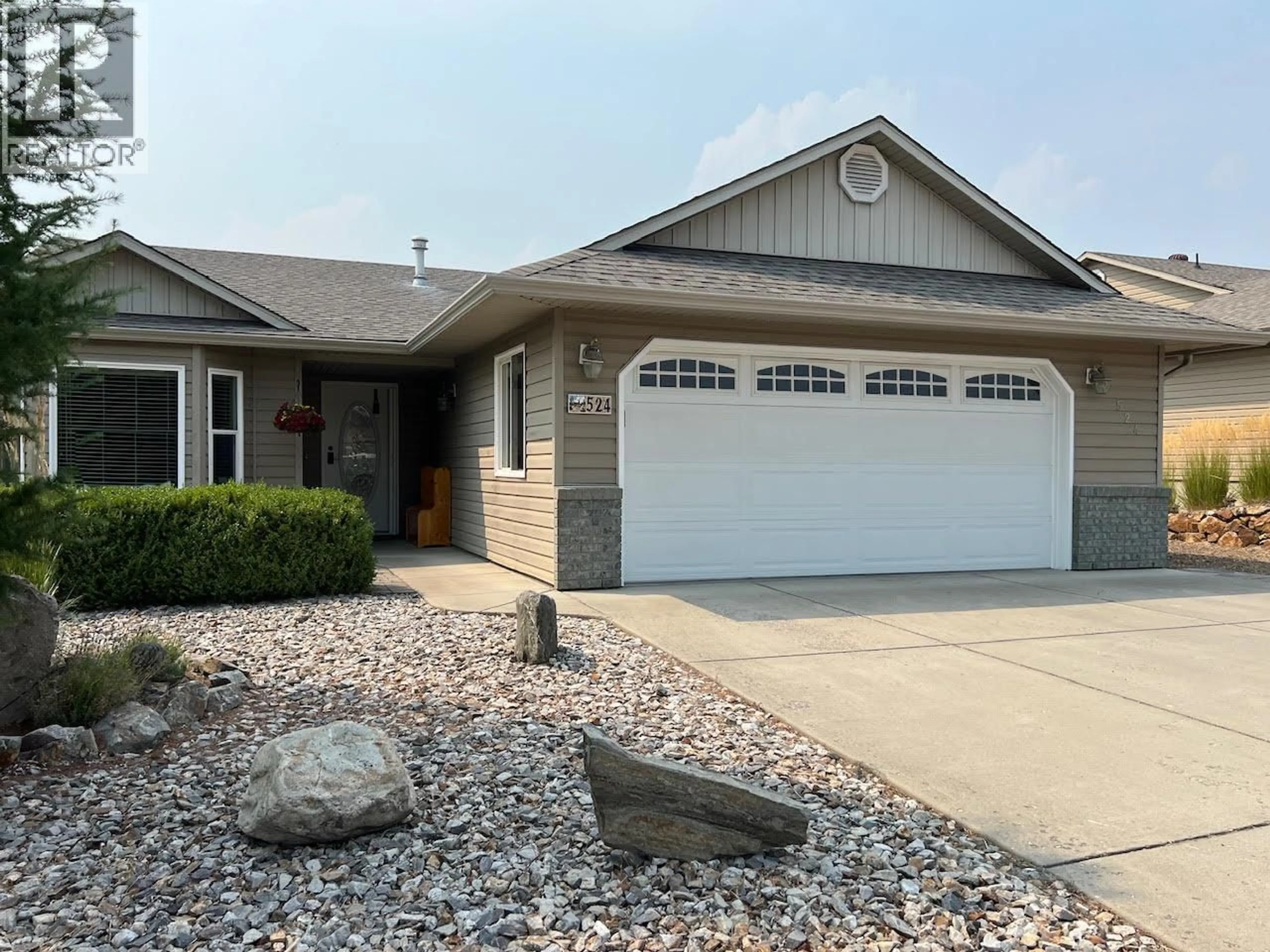 Home with vinyl exterior material, street for 524 5 STREET, Vernon British Columbia V1H1Z1