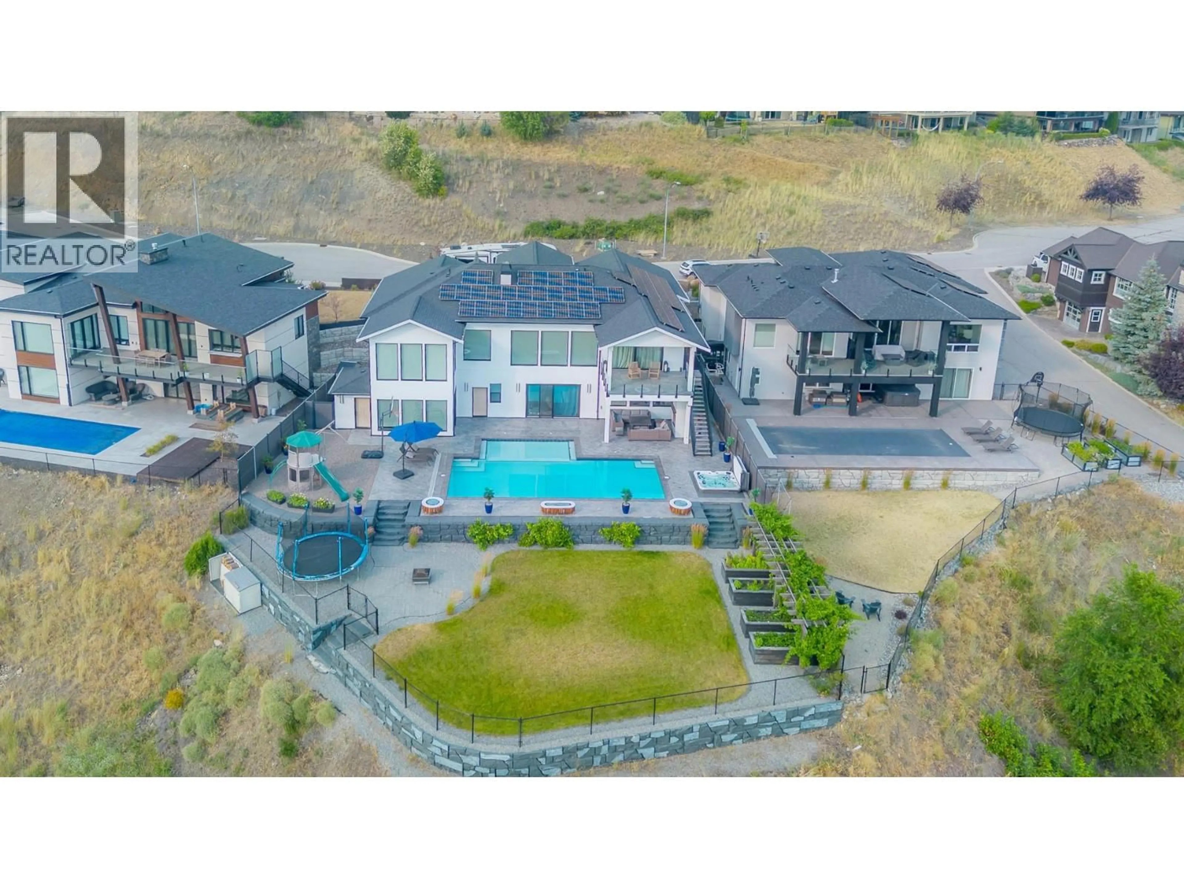 A pic from outside/outdoor area/front of a property/back of a property/a pic from drone, mountain view for 628 HART PLACE, Vernon British Columbia V1B4B2