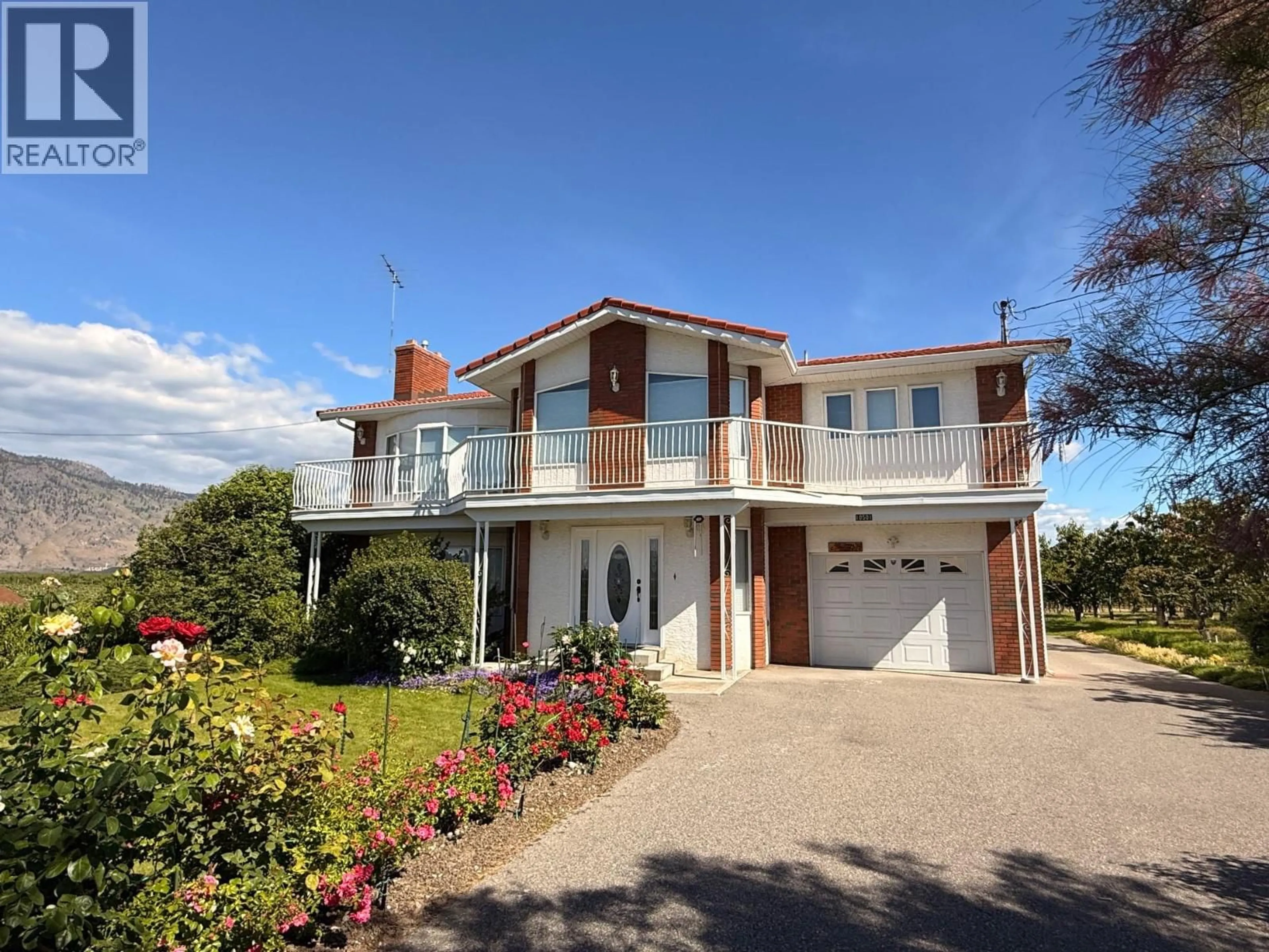 A pic from outside/outdoor area/front of a property/back of a property/a pic from drone, street for 10501 100TH AVENUE, Osoyoos British Columbia V0H1V2