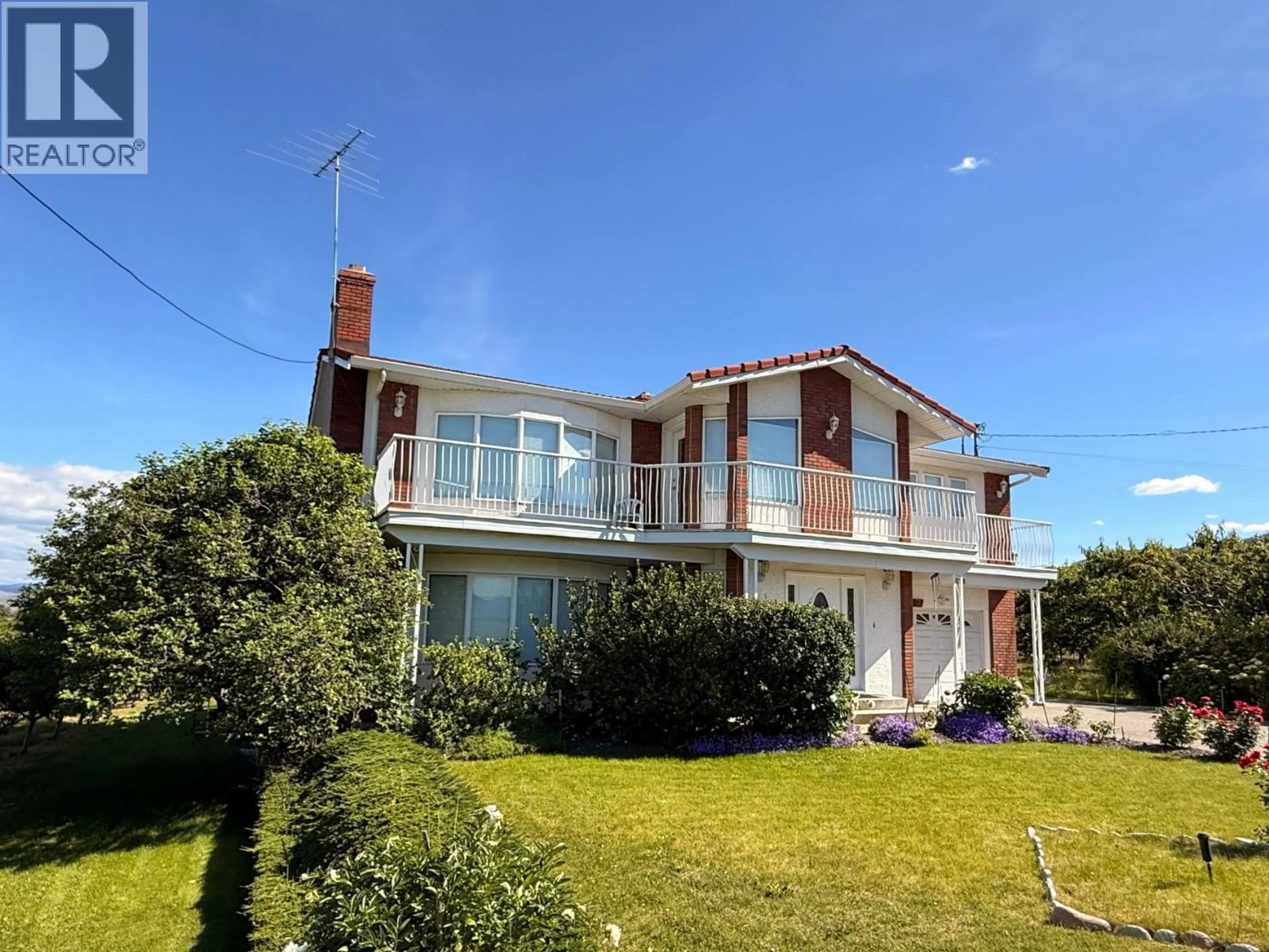 A pic from outside/outdoor area/front of a property/back of a property/a pic from drone, building for 10501 100TH AVENUE, Osoyoos British Columbia V0H1V2
