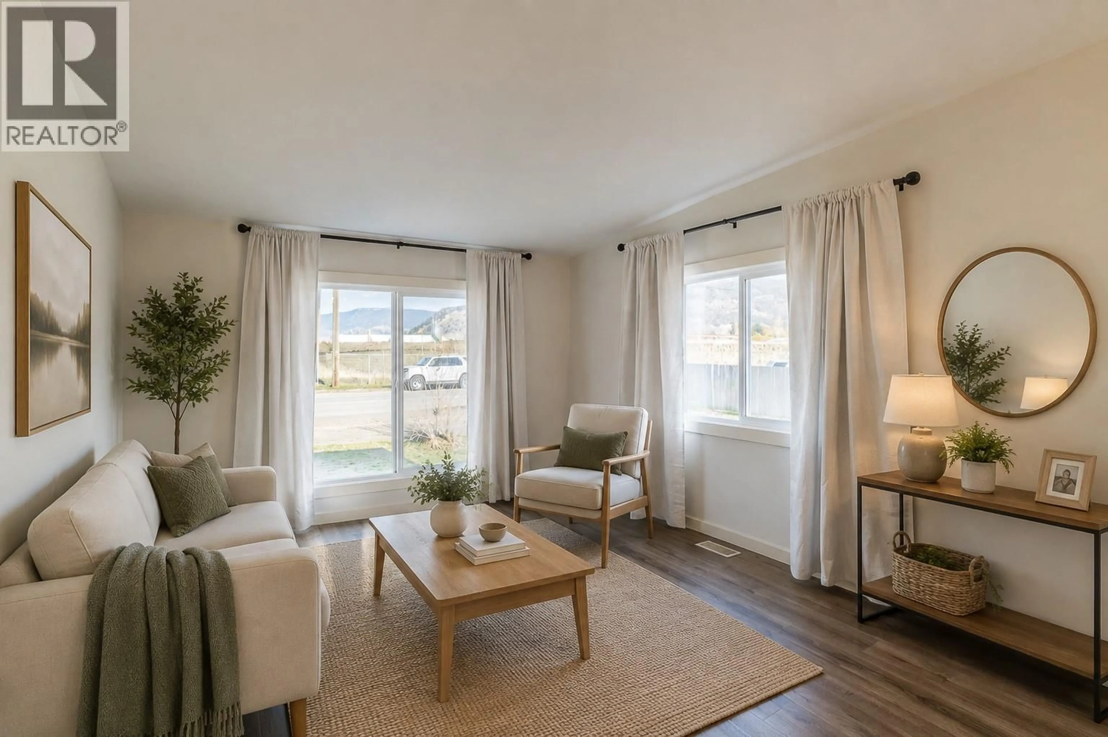Living room with furniture, wood/laminate floor for 1202 HOUSTON STREET, Merritt British Columbia V1K1E1