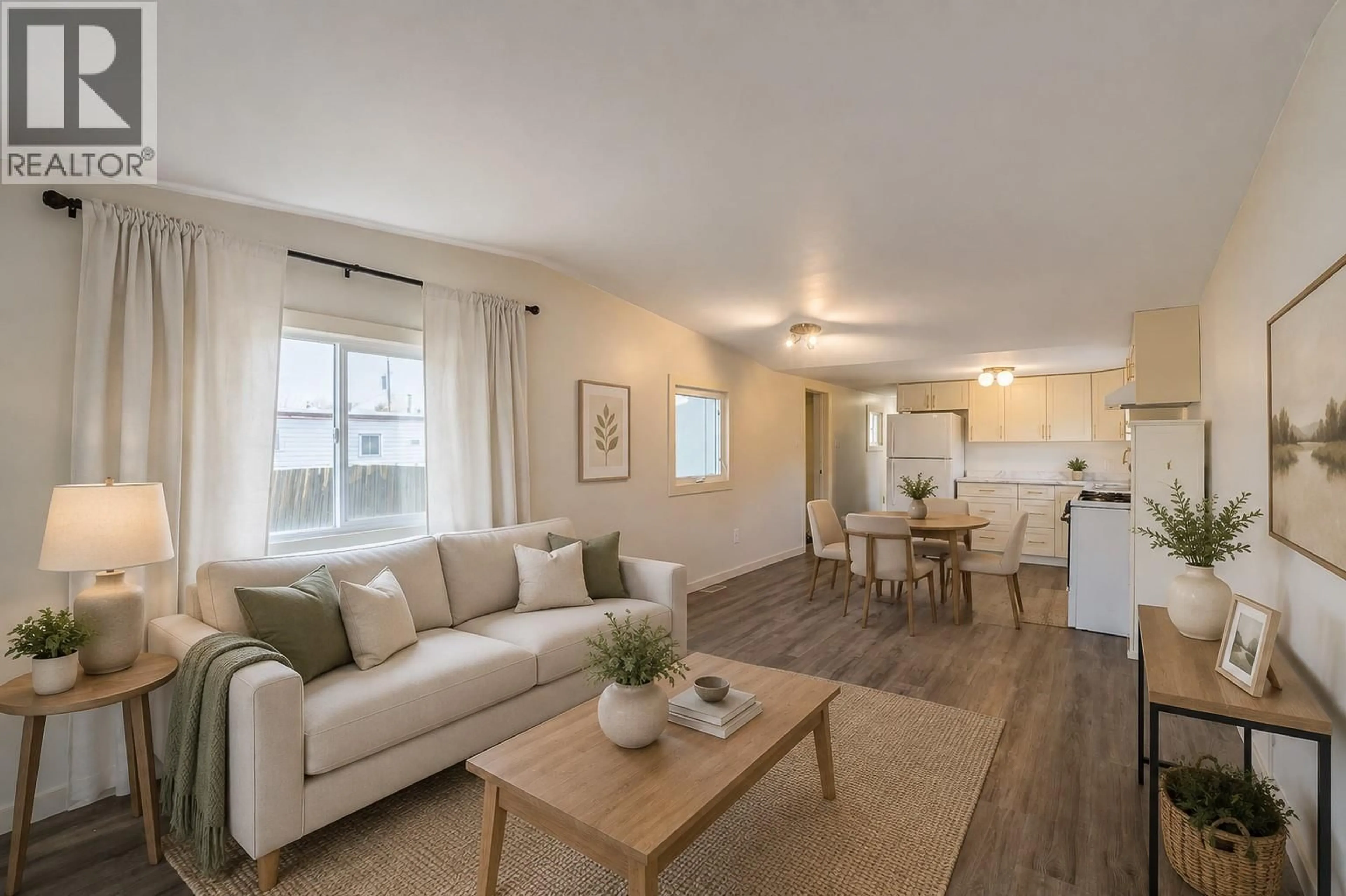 Living room with furniture, wood/laminate floor for 1202 HOUSTON STREET, Merritt British Columbia V1K1E1