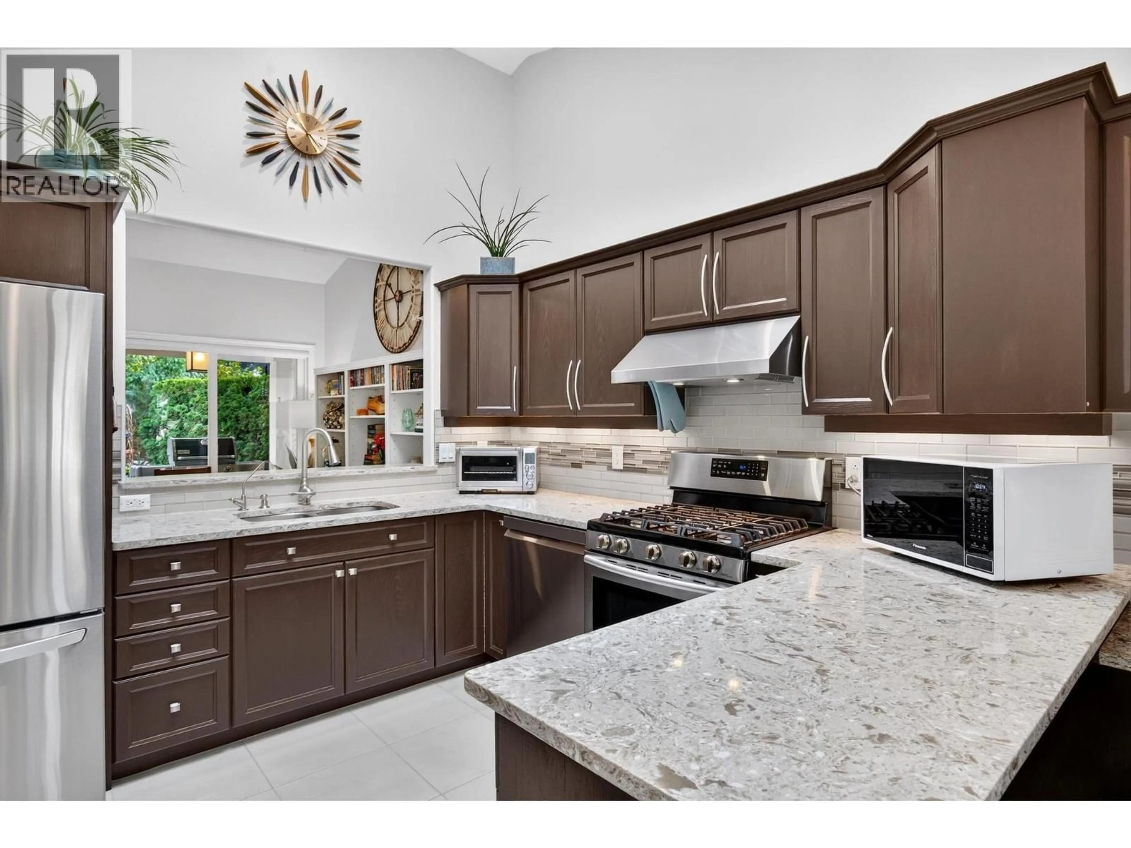 Contemporary kitchen, ceramic/tile floor for 4023 GALLAGHERS TERRACE, Kelowna British Columbia V1W3Z8