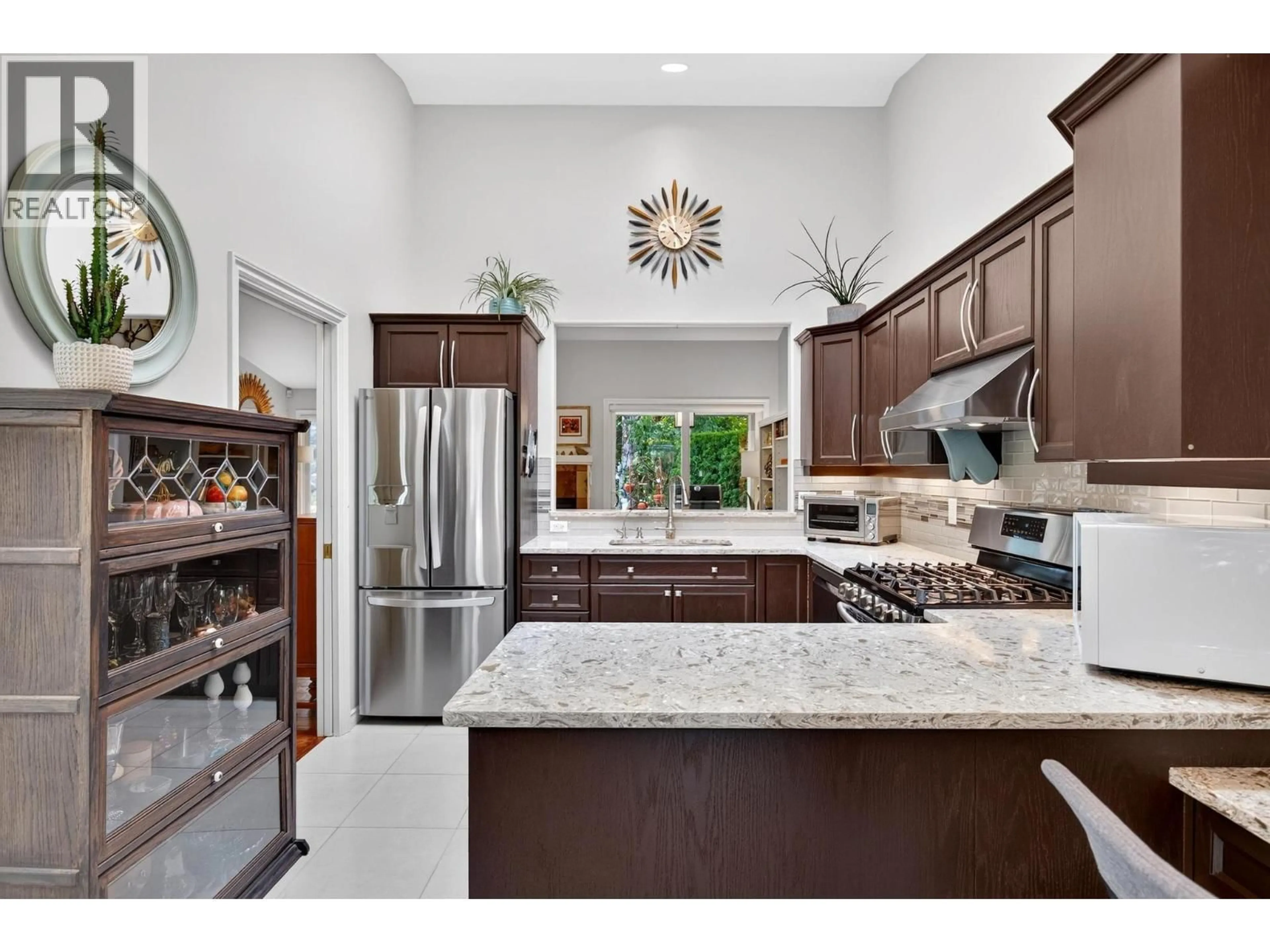 Contemporary kitchen, ceramic/tile floor for 4023 GALLAGHERS TERRACE, Kelowna British Columbia V1W3Z8
