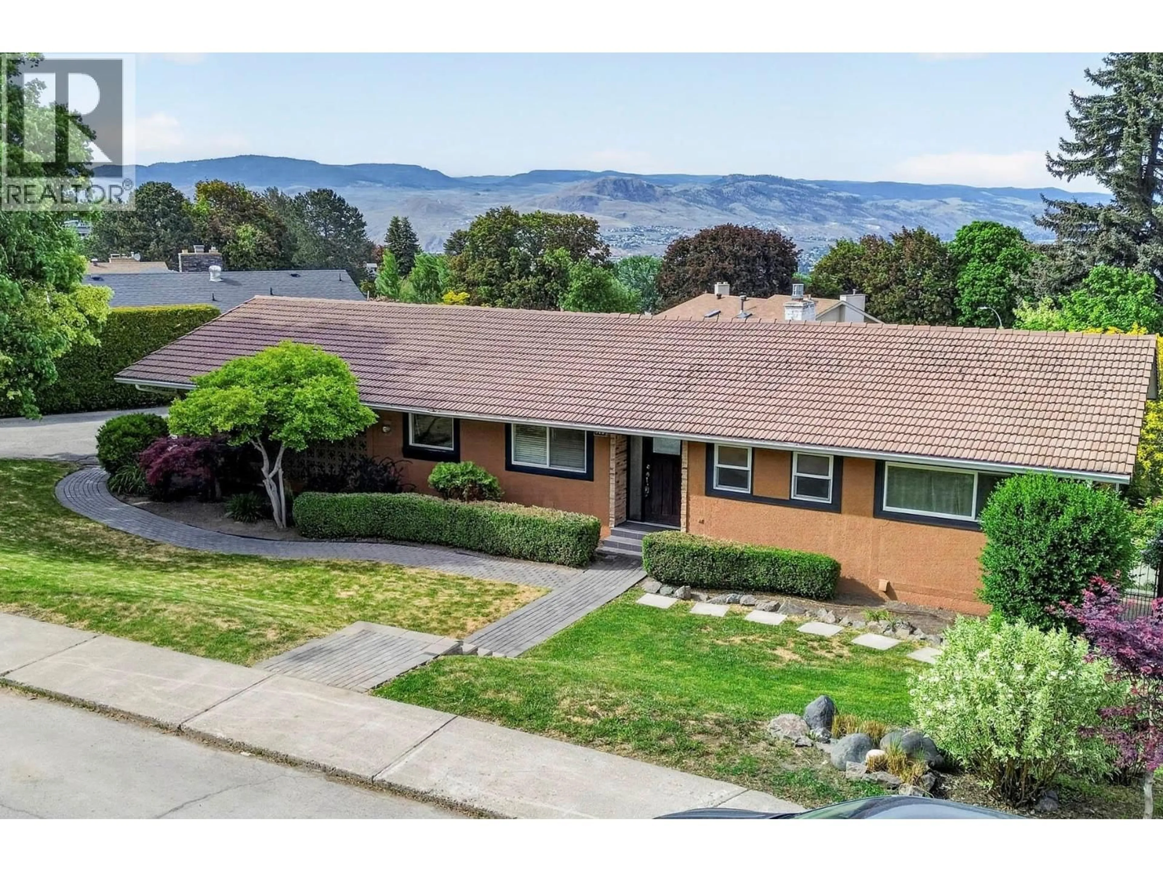 A pic from outside/outdoor area/front of a property/back of a property/a pic from drone, unknown for 328 MCGILL ROAD, Kamloops British Columbia V2C1M1